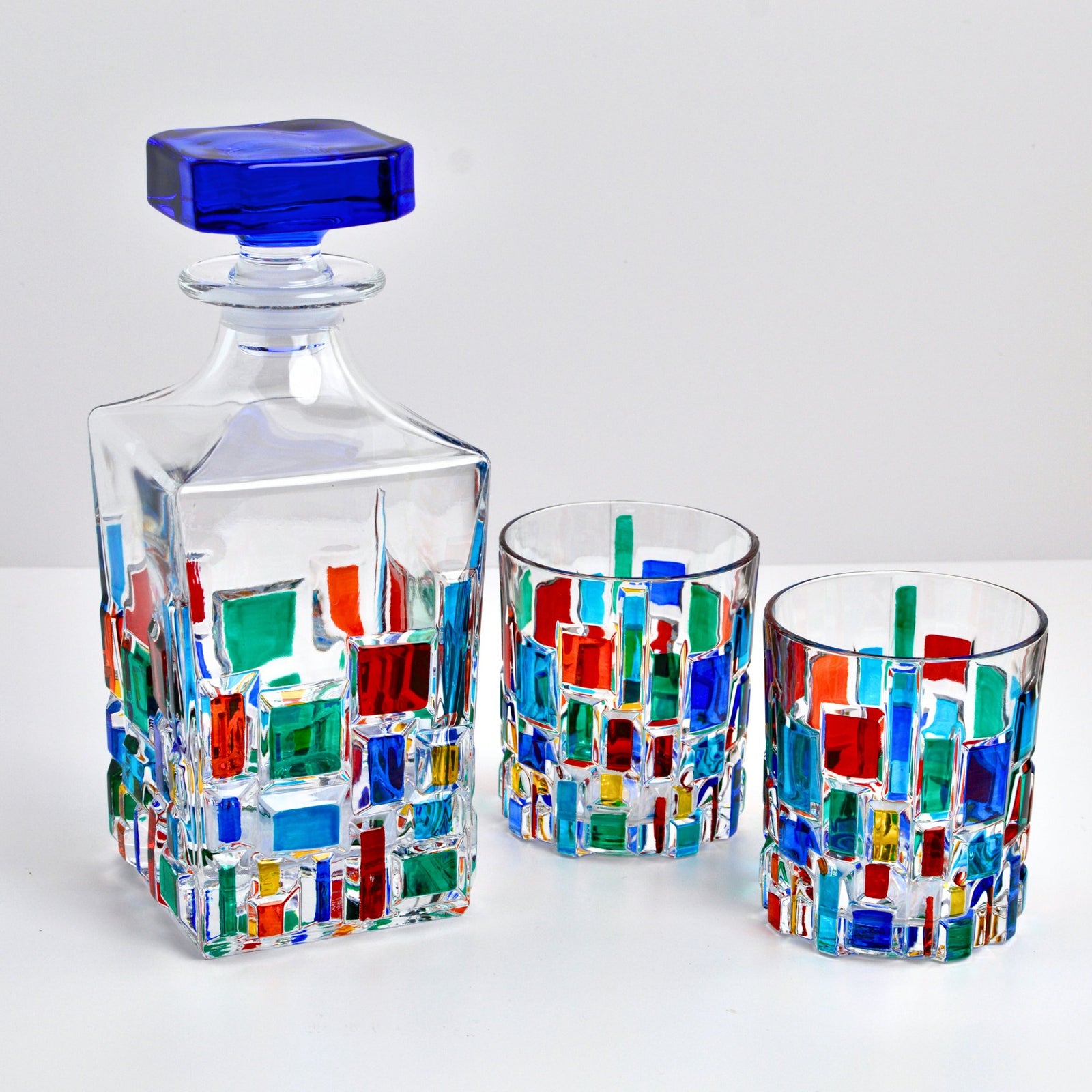 Colorful Etna hand-painted Italian crystal decanter by MyItalianDecor, showcasing intricate design and vibrant multi-color details.