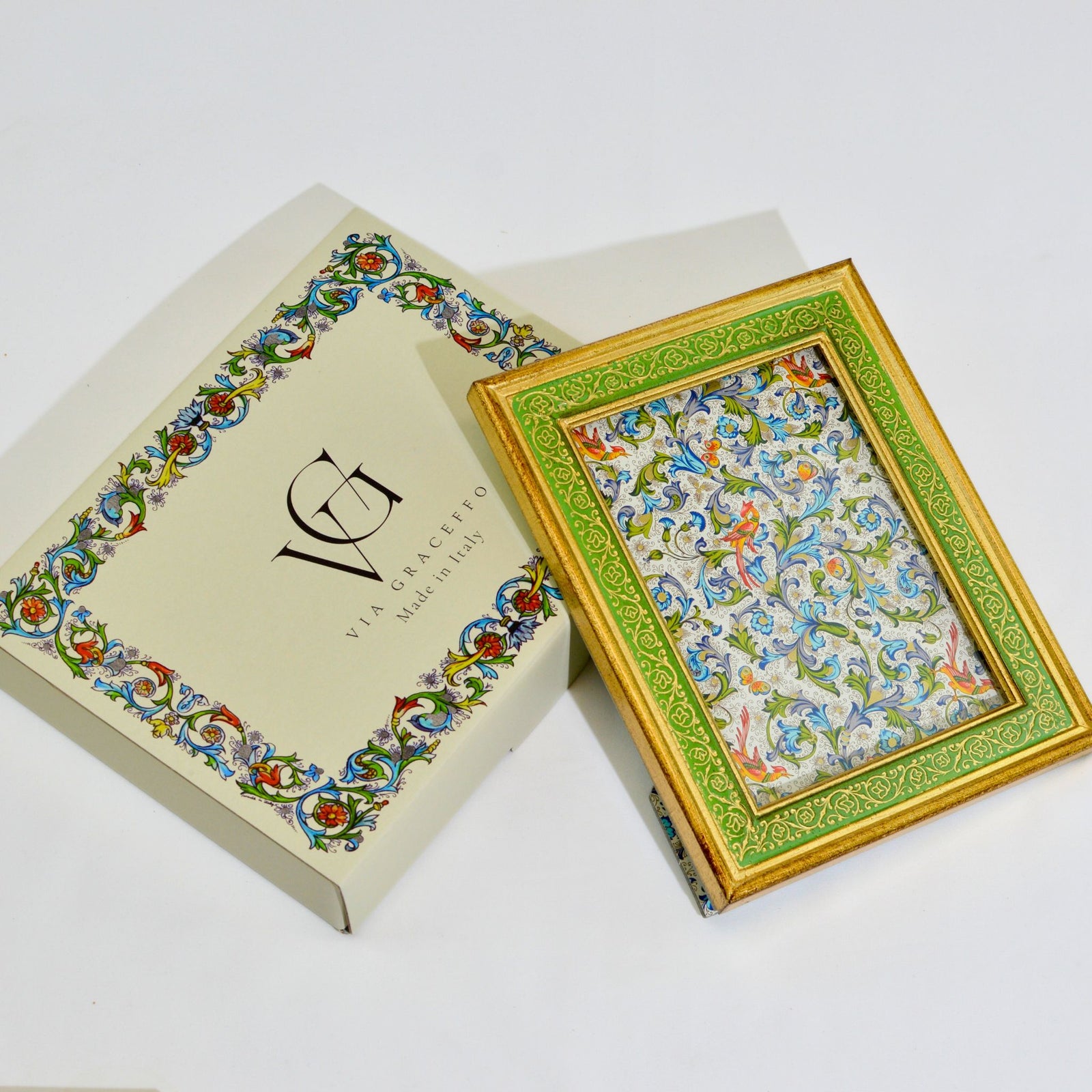 Gold Italian Florentine carved wood photo frame with floral embossing, available in 4x6, 5x7, and 8x10 sizes.