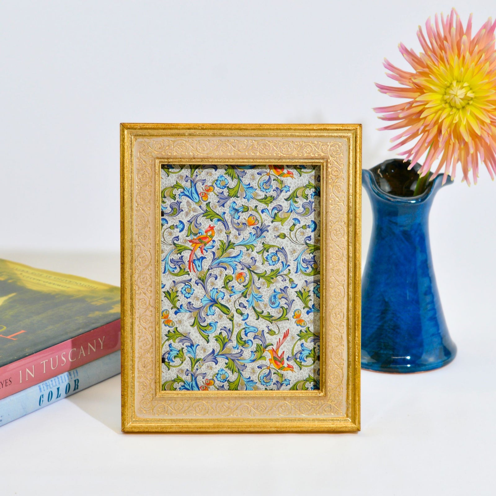 Gold Italian Florentine carved wood photo frame with floral embossing, available in 4x6, 5x7, and 8x10 sizes.