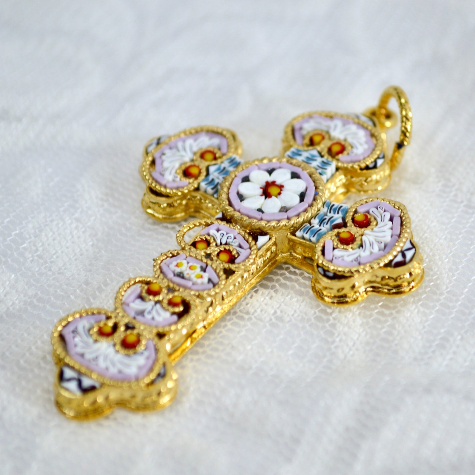 Florentine glass mosaic cross pendant crafted in Italy with colorful mosaic design, gold accents, and detailed craftsmanship.