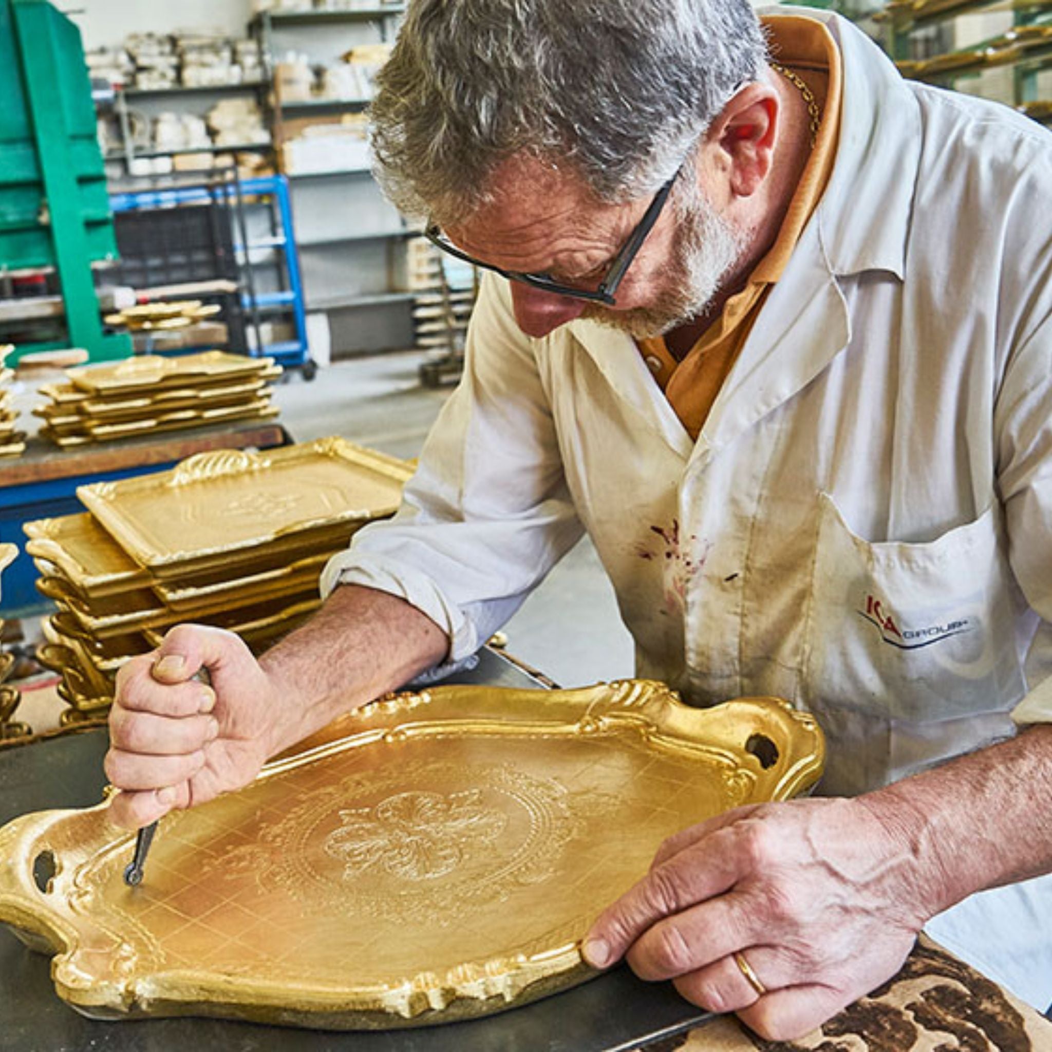 Decorative Florentine carved wood oval tray in multiple colors and sizes, featuring intricate patterns and elegant craftsmanship.