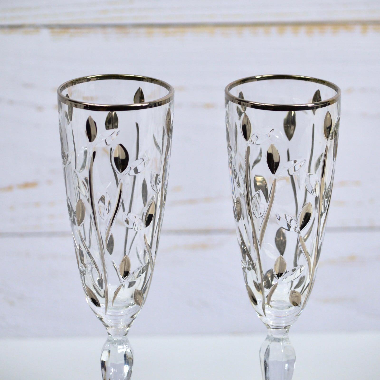 Two DZ Flowervine Platinum Champagne Glasses with elegant floral design, set of 2, showcasing clear glass with platinum accents.