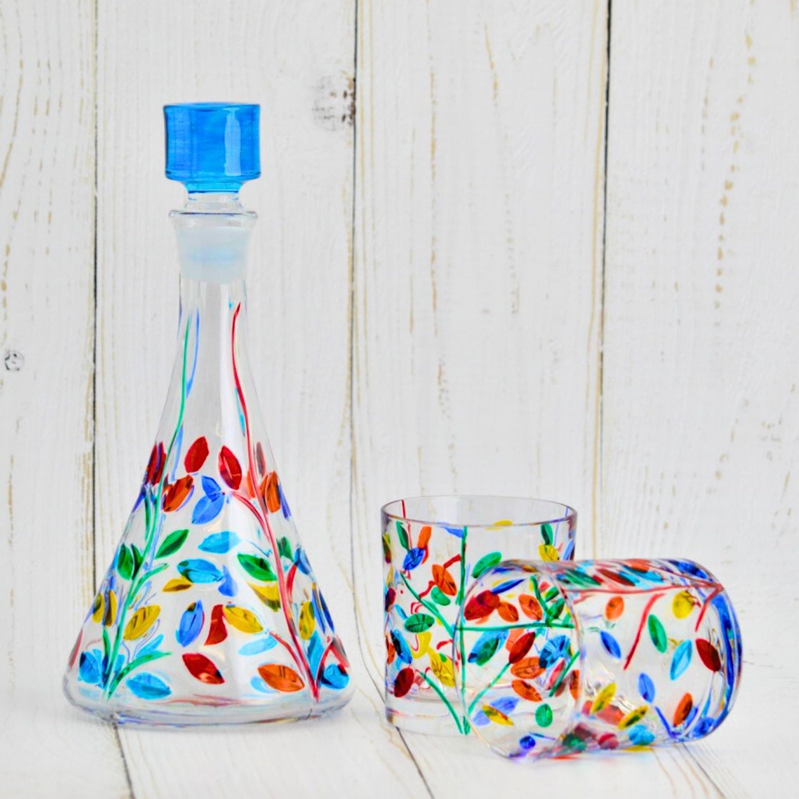 Elegant hand-painted crystal Flowervine Triangle Decanter by DZ, made in Italy, showcasing intricate floral design and fine craftsmanship.