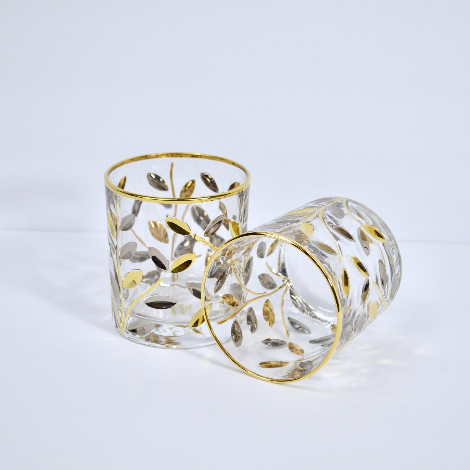 DZ Flowervine short drink glasses set of 2, Italian crystal tumblers with gold and platinum accents on clear glass.