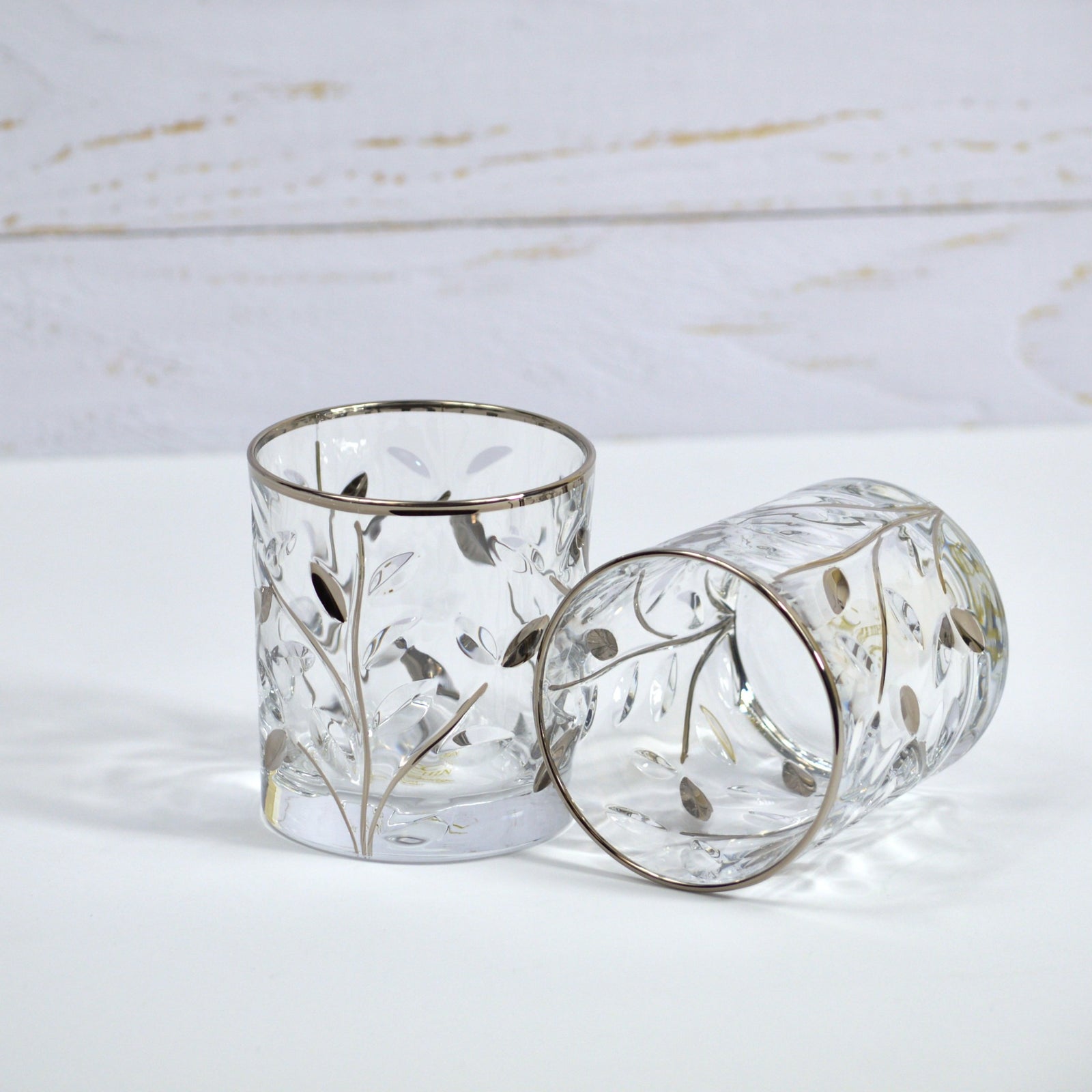 Set of two DZ Flowervine short drink glasses made of Italian crystal with platinum accents, perfect for elegant tumblers.