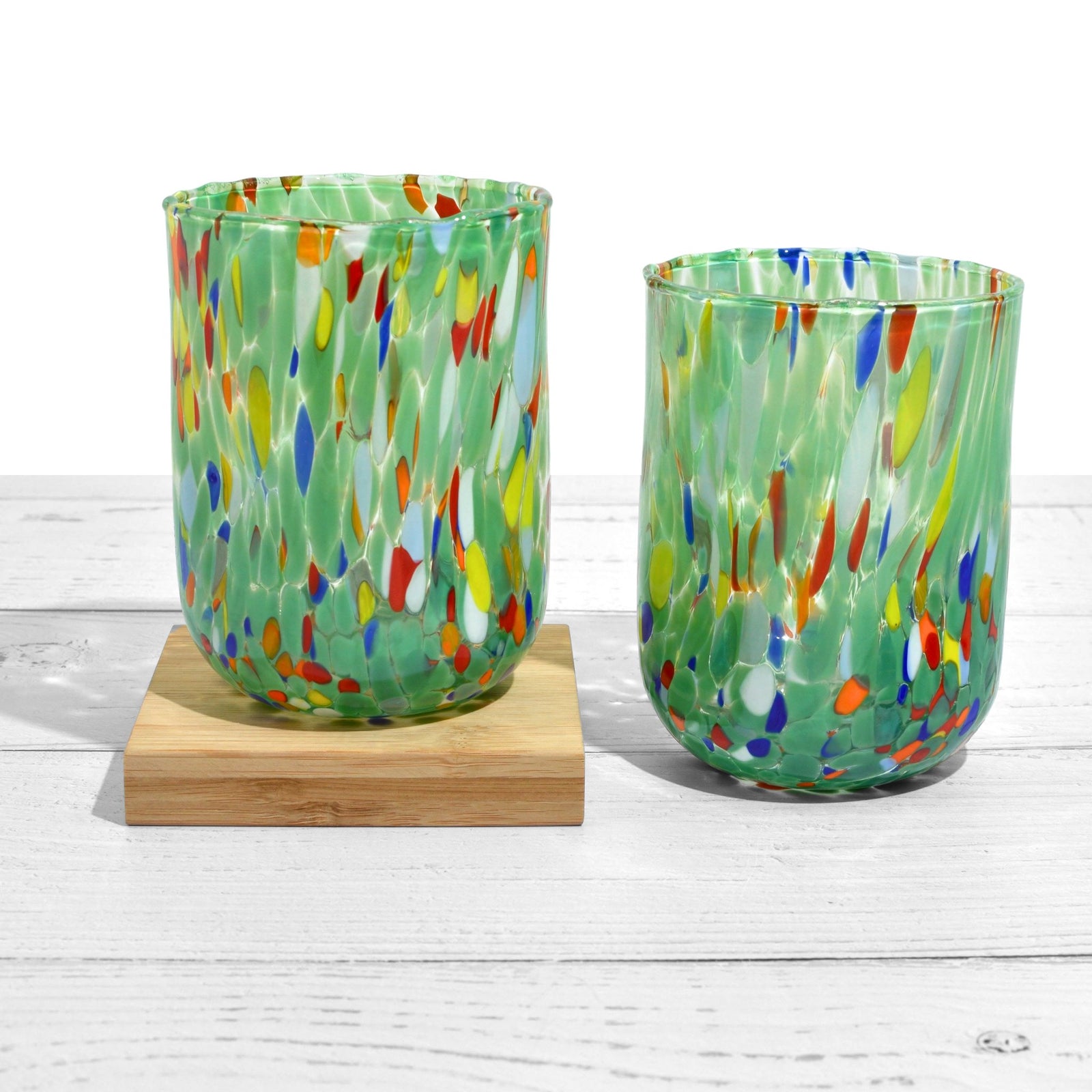 Set of 2 Murano glass tumblers with assorted colors, featuring elegant design from Fresca Due for stylish drinks.