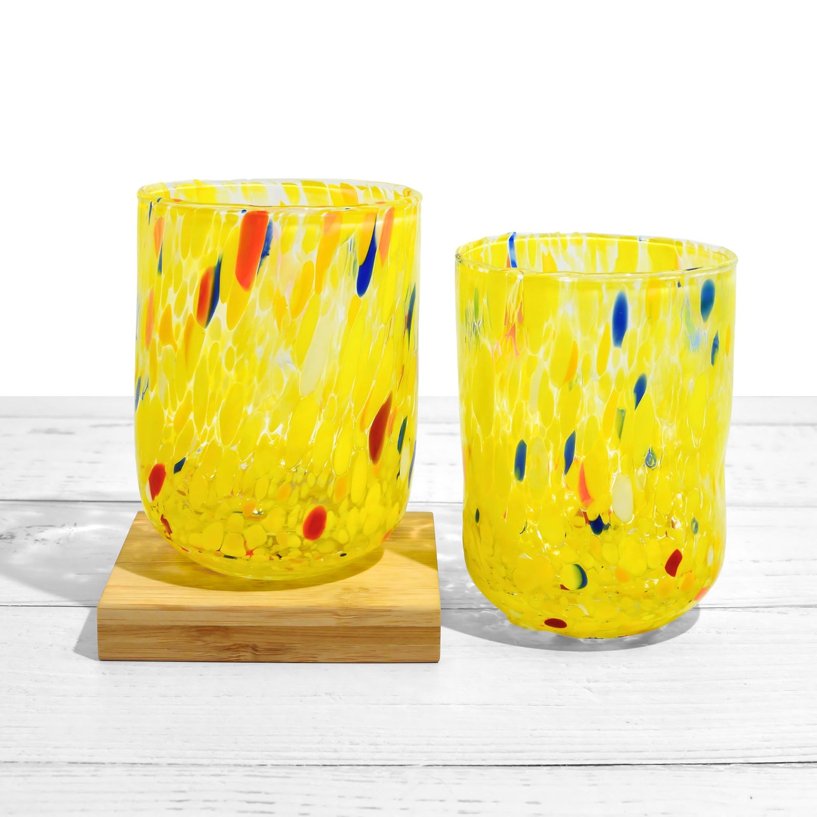 Set of 2 Murano glass tumblers with assorted colors, featuring elegant design from Fresca Due for stylish drinks.