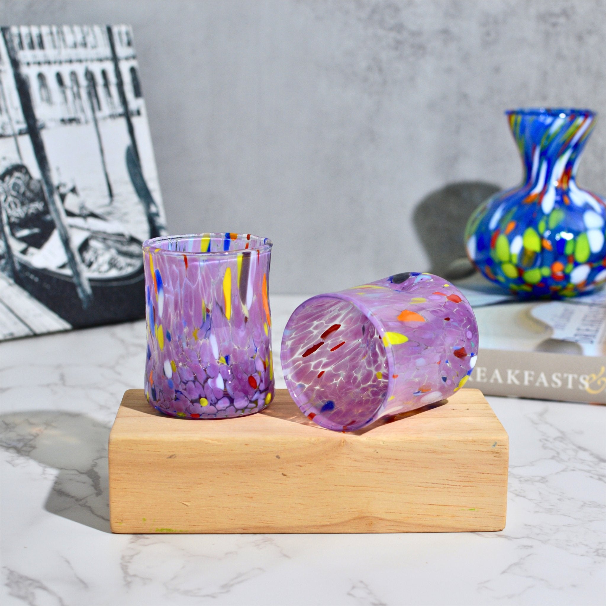 Set of two Murano Glass Fresca shot glasses in violet, made in Italy, featuring intricate handcrafted design by MyItalianDecor.