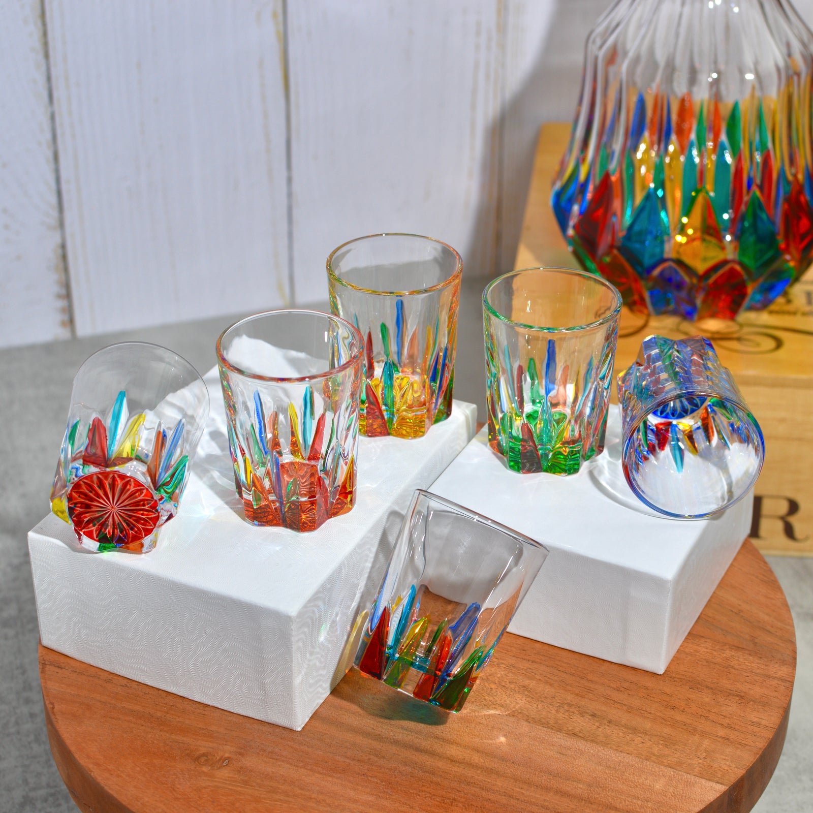 Set of four clear shot glasses with a wooden tray, from My Italian Decor, perfect for serving spirits or as a gift.