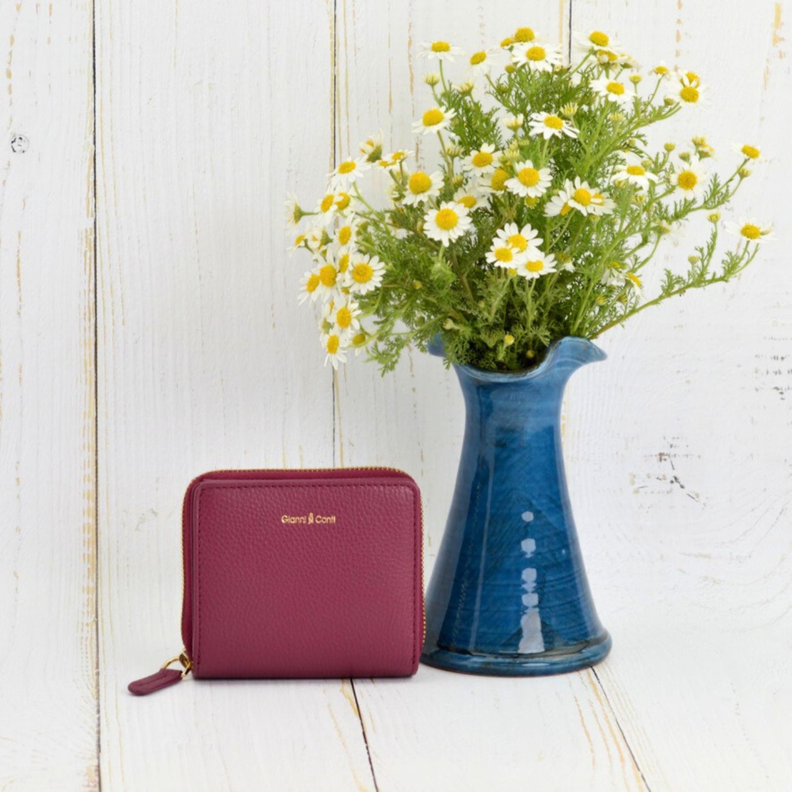 Red Genova Italian leather zip-around wallet by My Italian Decor, showcasing sleek design and fine craftsmanship.