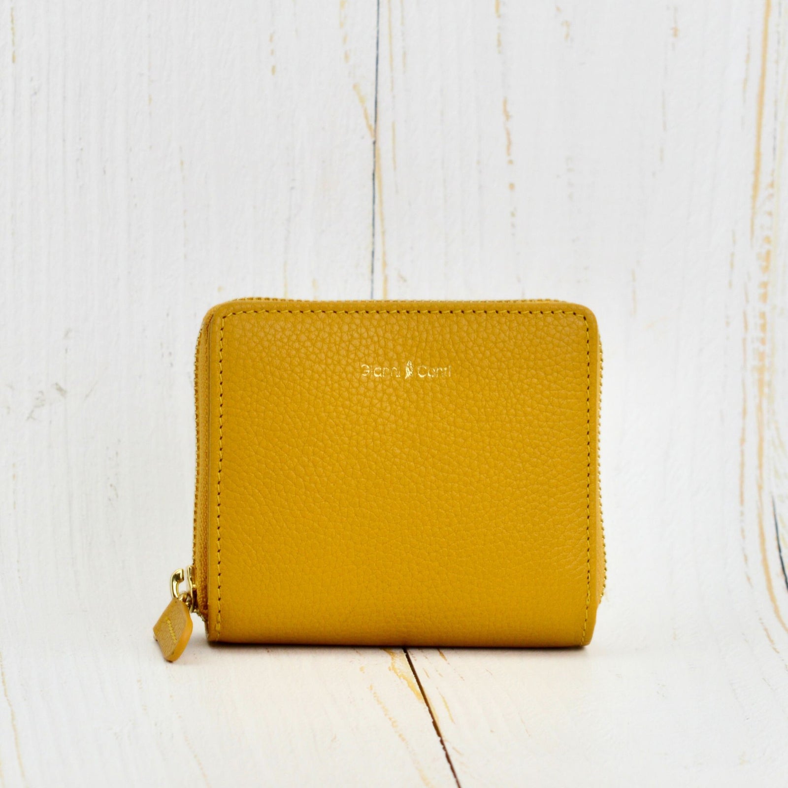 Red Genova Italian leather zip-around wallet by My Italian Decor, showcasing sleek design and fine craftsmanship.