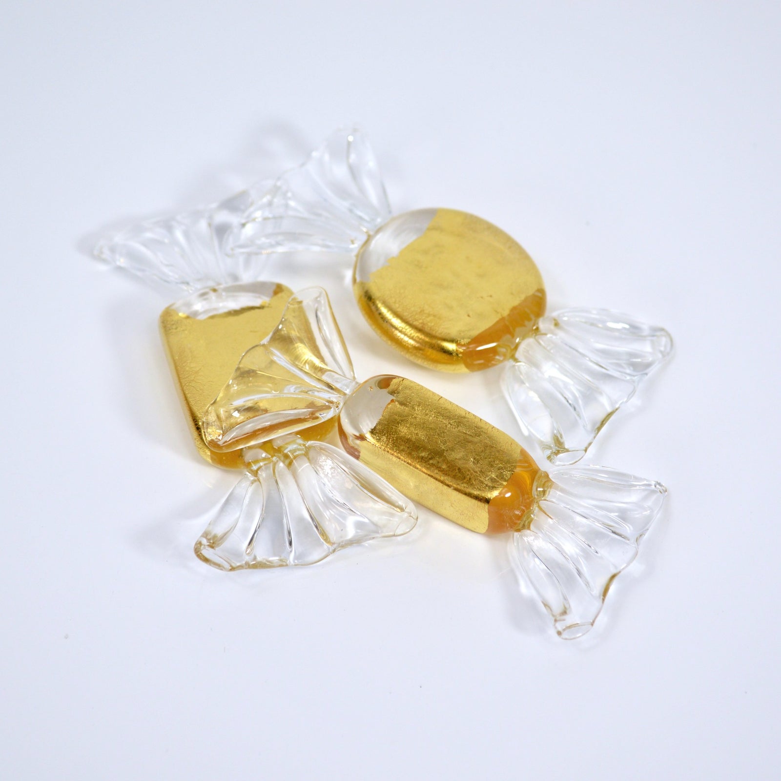 Set of gold Murano glass candy replicas, artificial food decor by MyItalianDecor, showcasing shiny, detailed candy pieces.