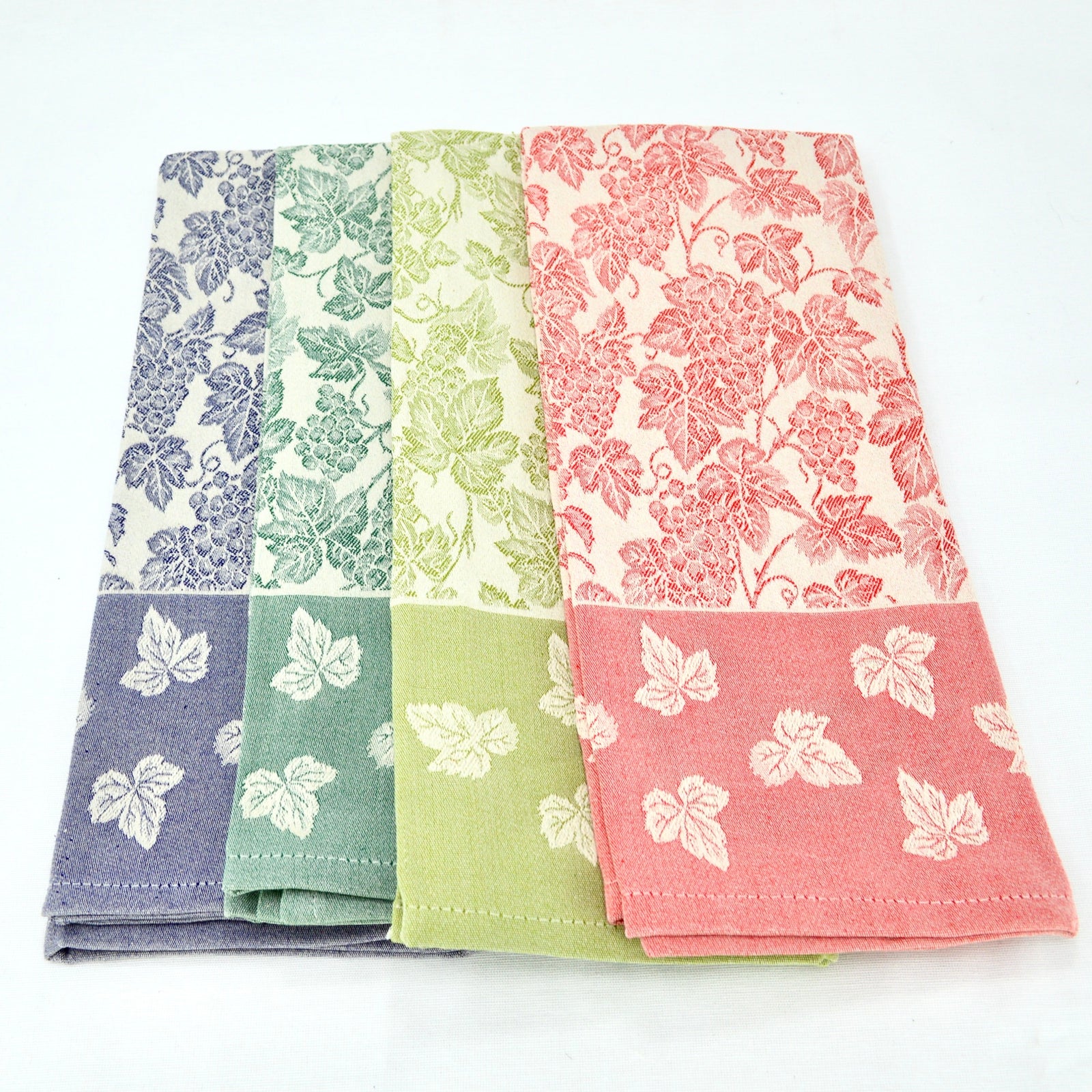 Busatti Uva kitchen towel in rose, part of My Italian Decor's assorted-color table linens, made in Italy with grape pattern detail.