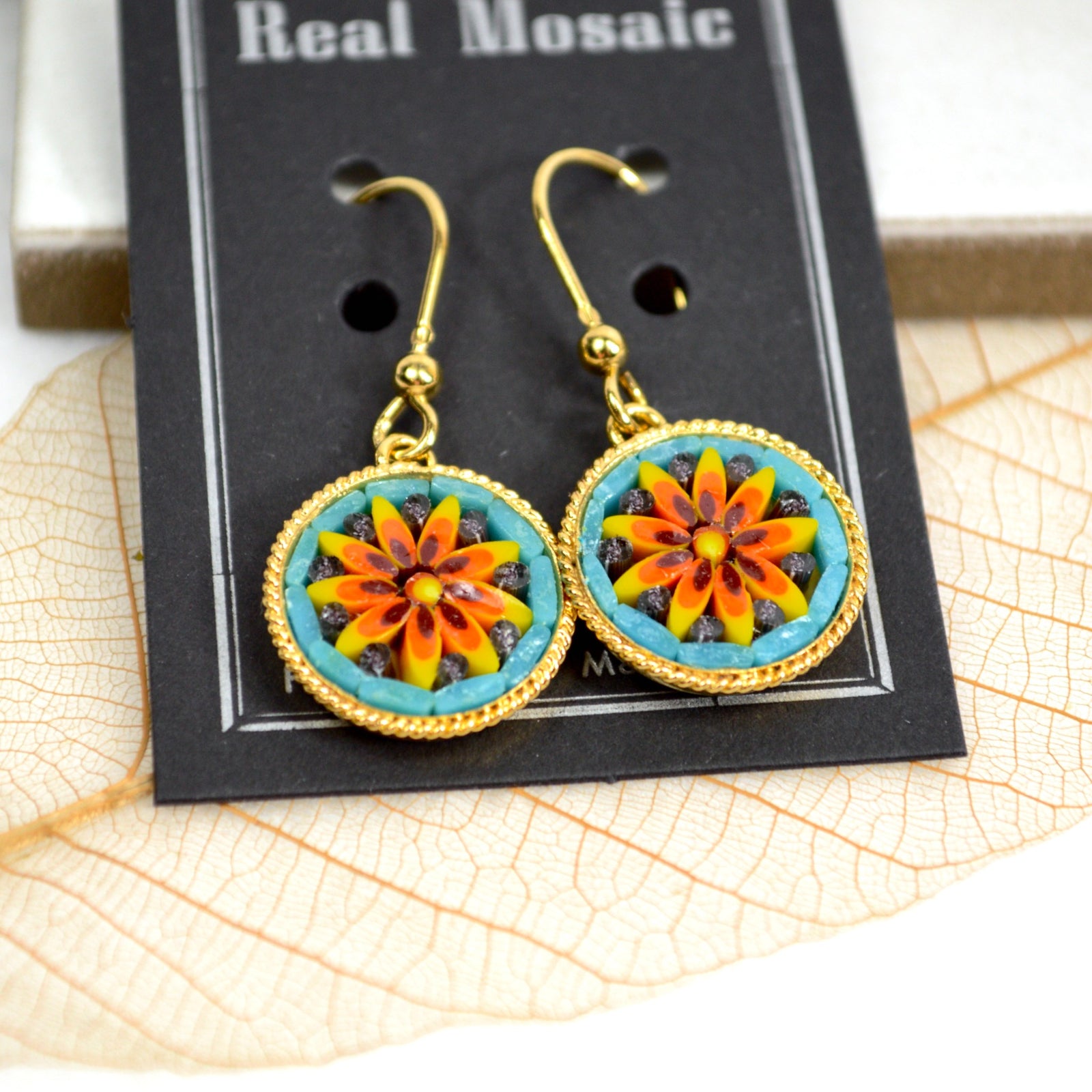 Large Florentine micro mosaic earrings with colorful floral circle design, made in Italy, showcasing intricate blue and red flower patterns.