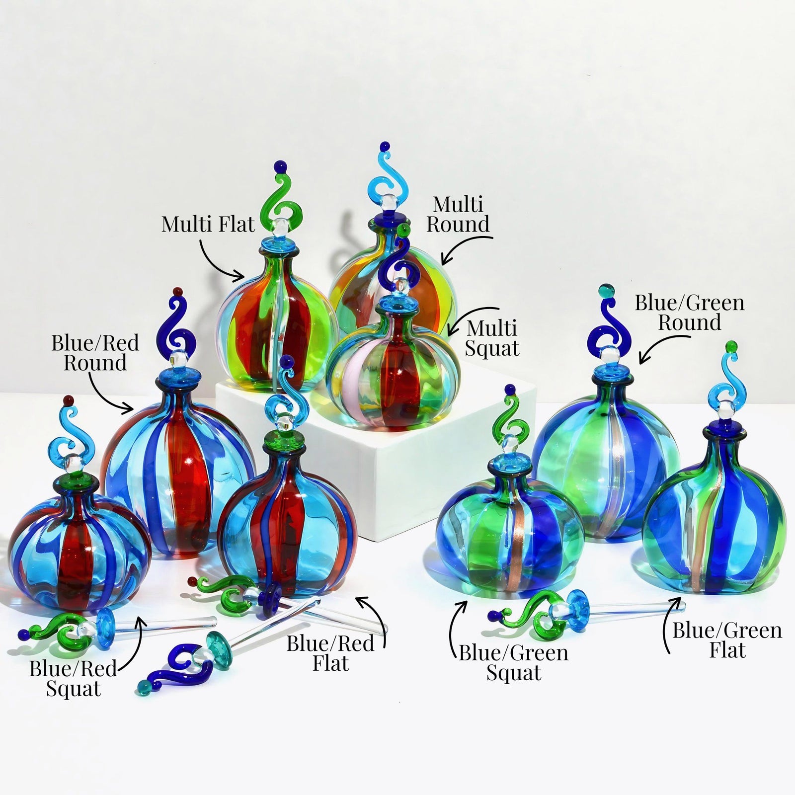 Multicolor Harlequin Murano glass perfume bottle, decorative Italian-made glass bottle with vibrant, artistic design.