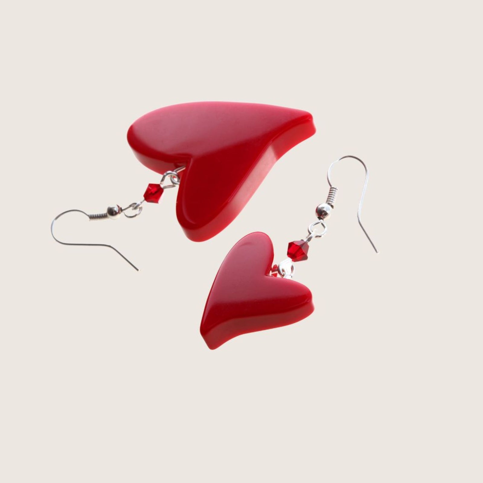 Red resin heart earrings from My Italian Decor, handcrafted jewelry set featuring charming heart-shaped dangle earrings.