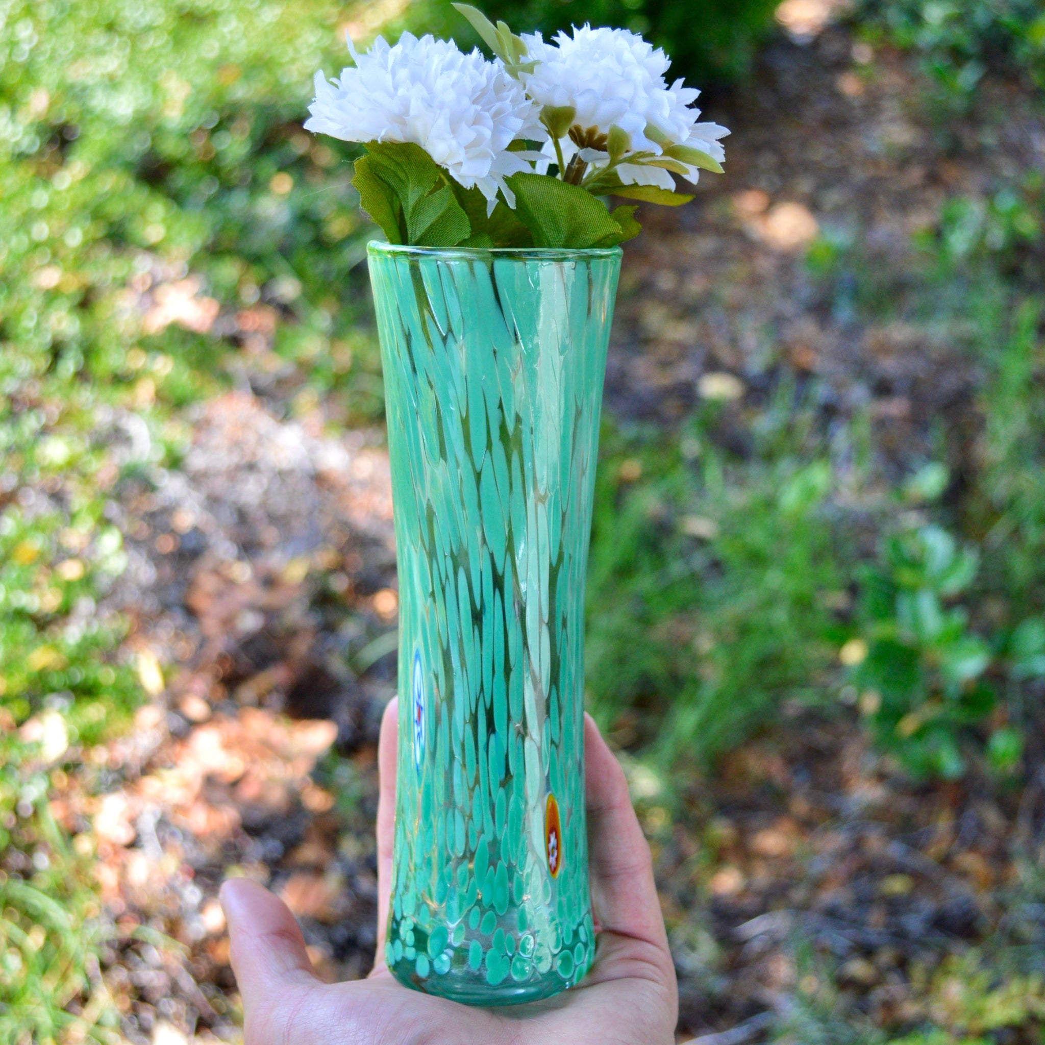 Mint green Murano glass bud vase by MyItalianDecor, contemporary Italian-made vase held in hand.