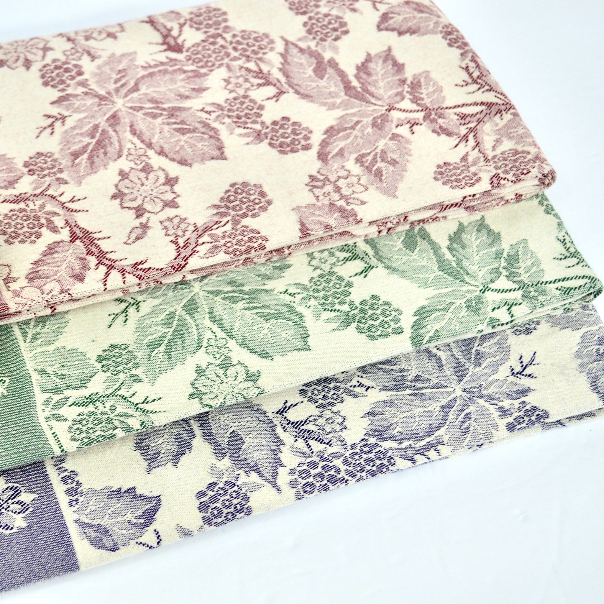 Busatti Berry Kitchen Towel by My Italian Decor, assorted colorful woven cotton kitchen towel made in Italy, displayed on a kitchen counter.
