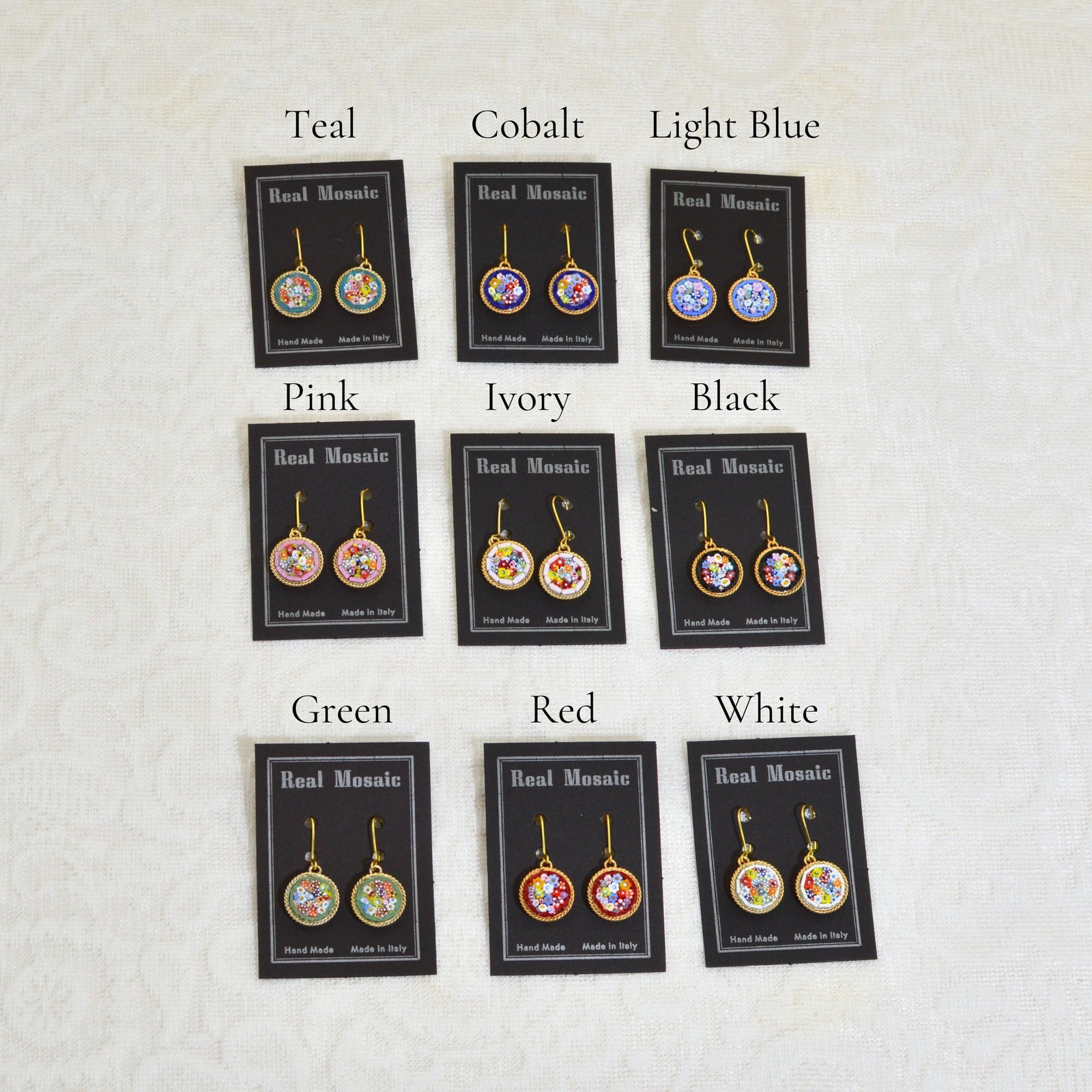 Large Florentine mosaic earrings in a circular shape, crafted in Italy, featuring colorful mosaic patterns and intricate details.