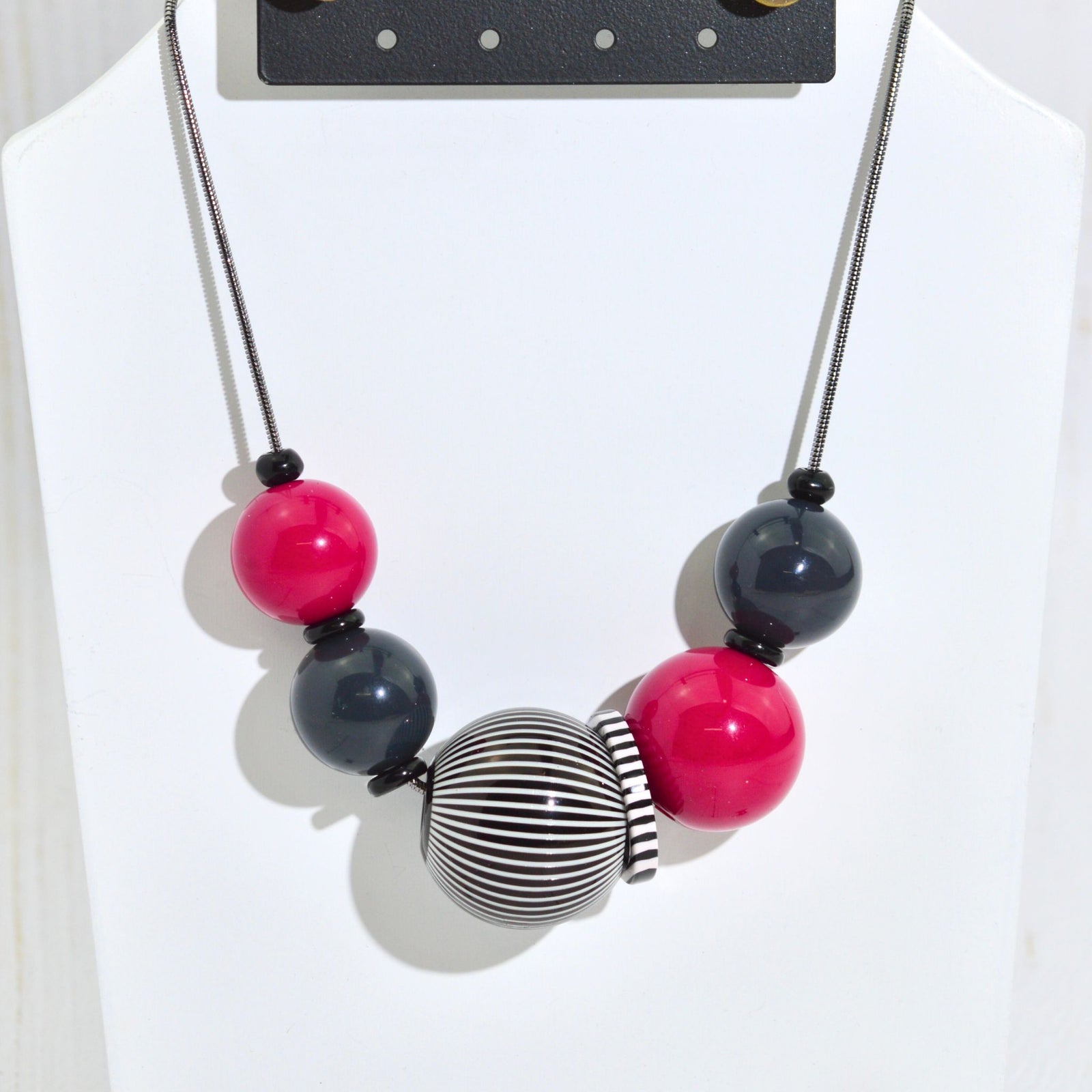 Close-up of the Anna Sphere Necklace in pink, handcrafted jewelry set by My Italian Decor featuring elegant Italian craftsmanship.