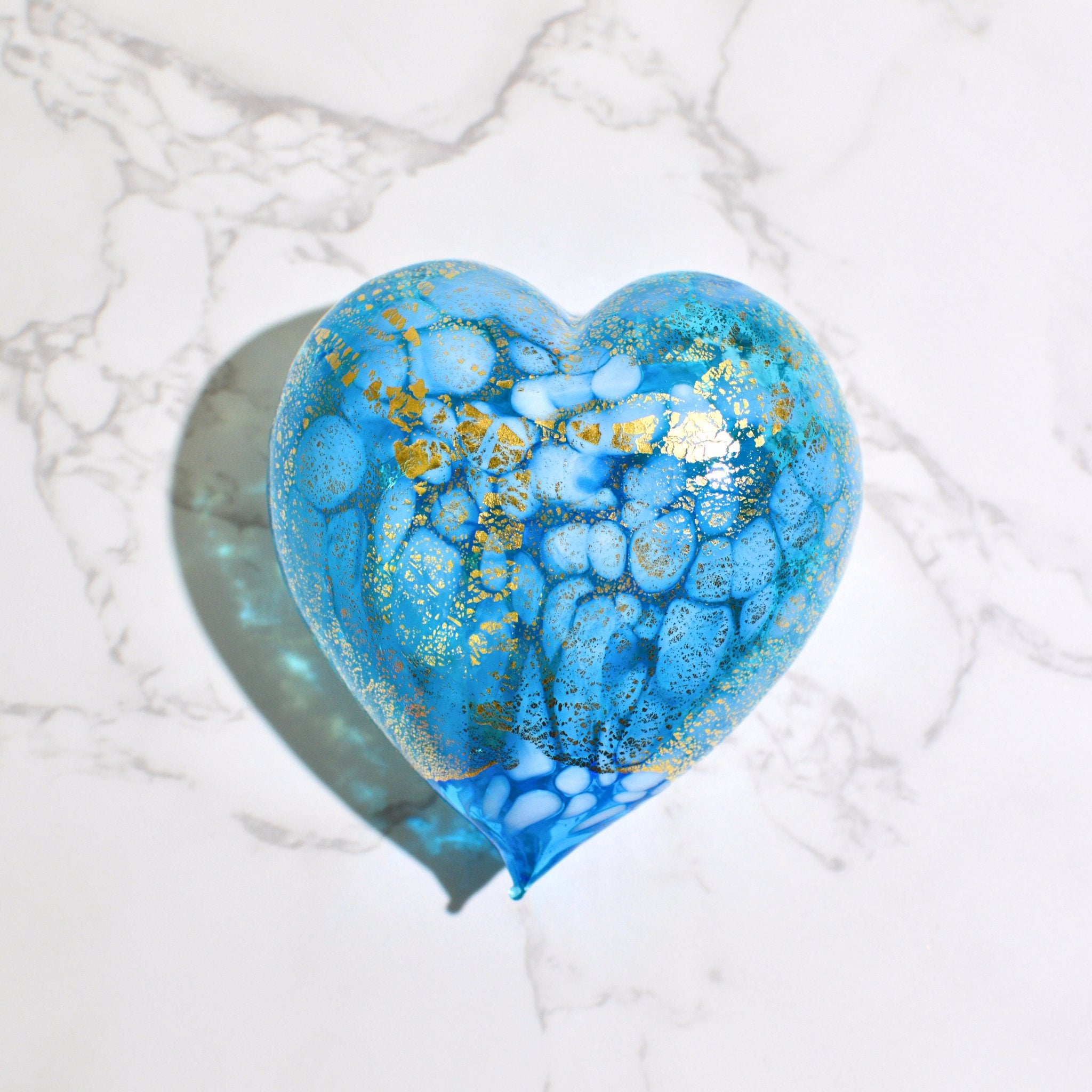 Murano blown glass heart figurine with macchia pattern and 24 kt gold patina, handcrafted decorative glass art piece.