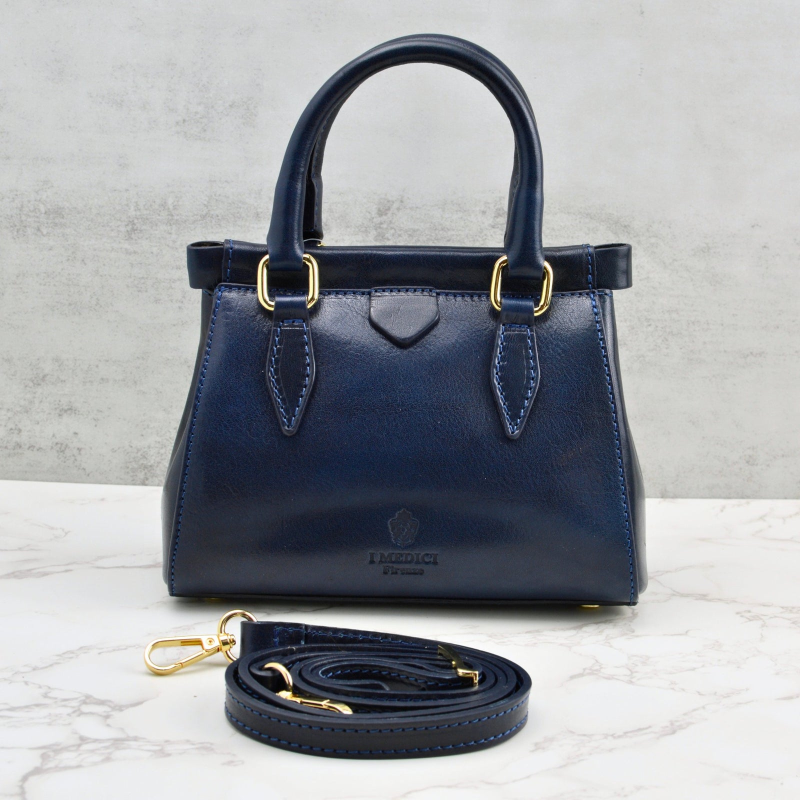Lizzy & Betta honey-colored Italian leather top handle handbag with structured design and elegant craftsmanship.
