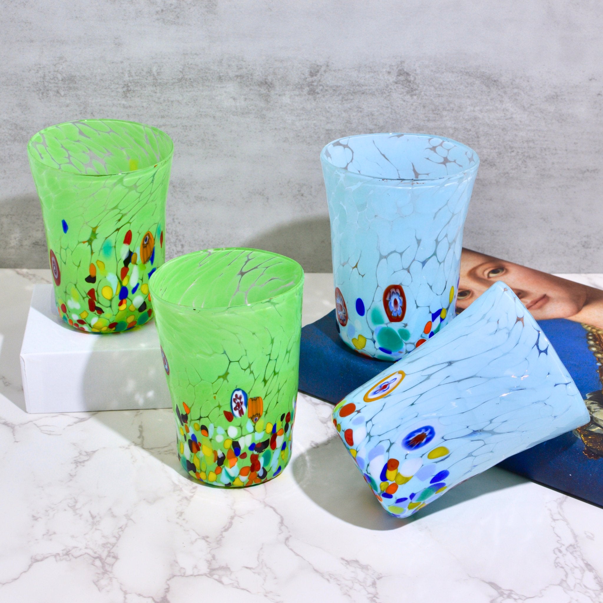 Light green and ice blue Medici Murano glass tumbler with Millefiori design, handcrafted drinking glass by MyItalianDecor.