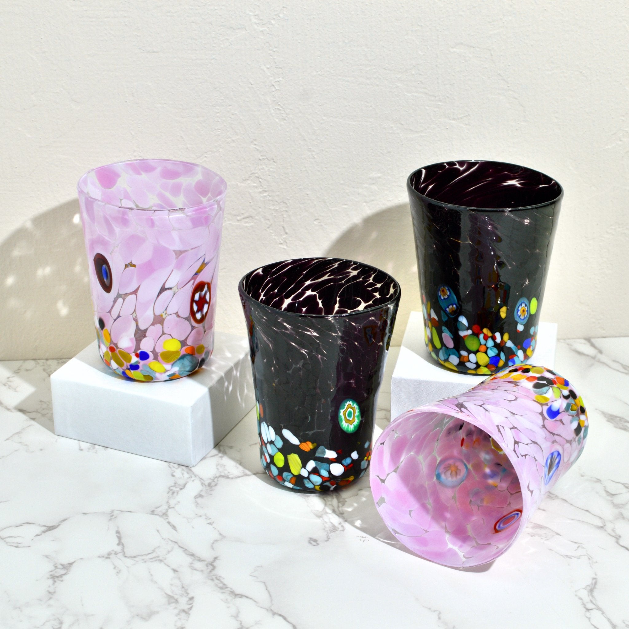Pink and black Medici Murano glass tumbler with Millefiori design, handcrafted drinking glass by MyItalianDecor.