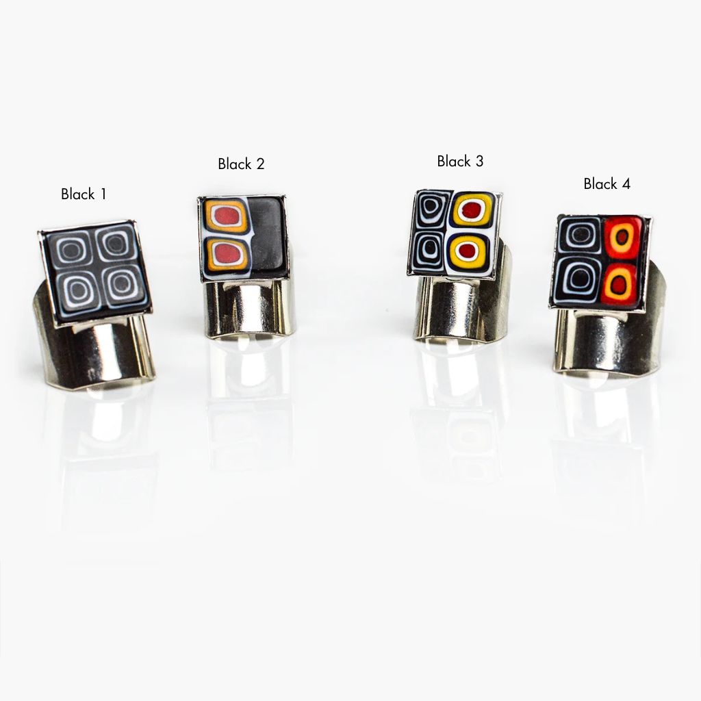 Set of adjustable Millefiori Murano glass rings in black and colorful patterns, crafted by My Italian Decor.