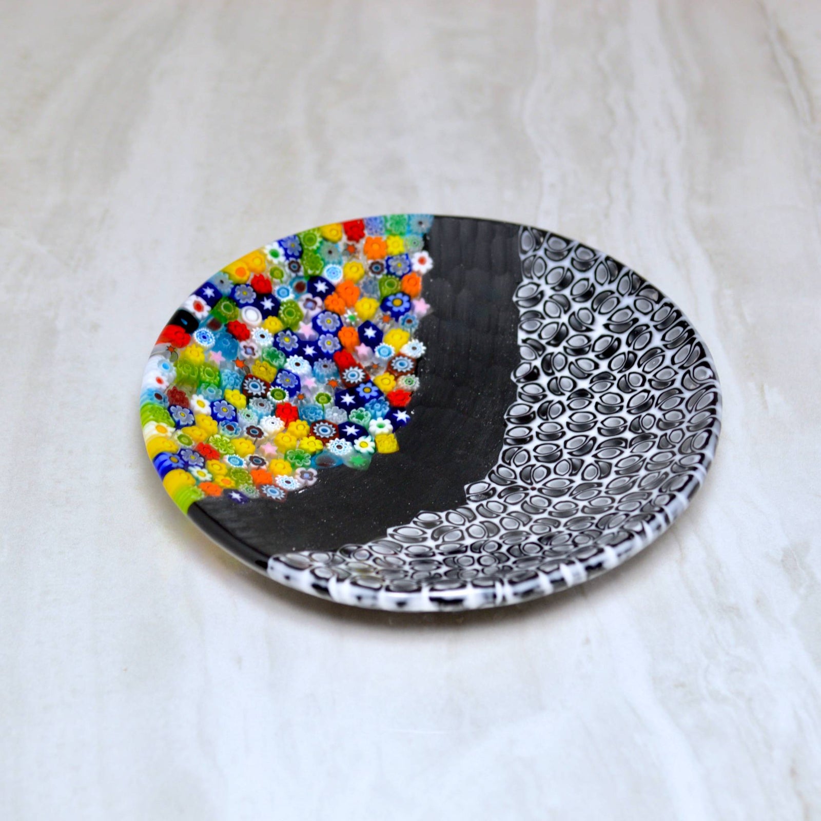 Round Murano glass Luca dish with colorful Millefiori pattern, black decorative tray made in Italy, by MyItalianDecor.