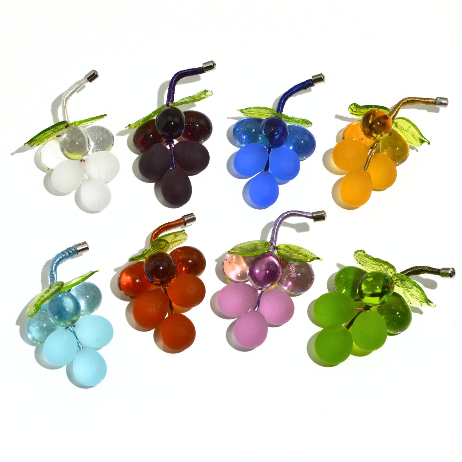 Mini Murano glass grape cluster in multiple colors, artificial floral decor made in Italy, viewed from top angle.