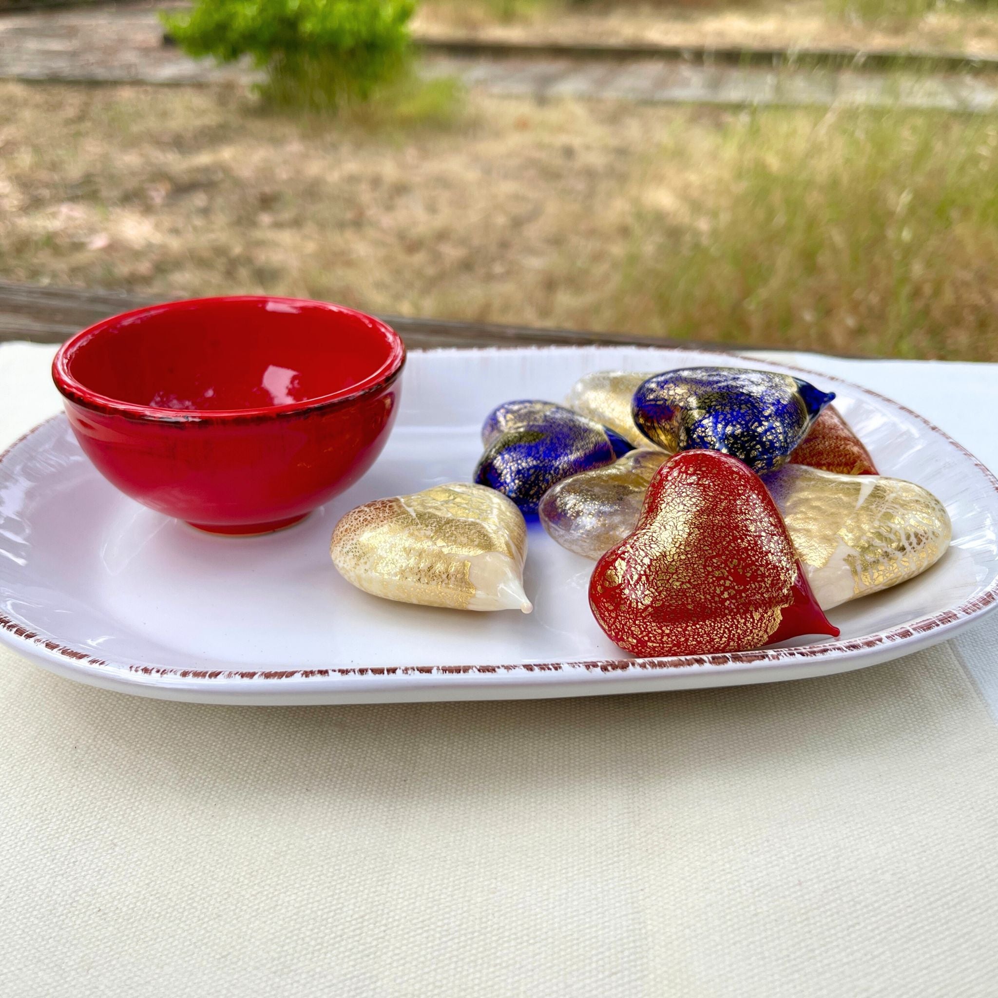 Set of three small Murano glass heart figurines in red, white, and blue, handmade in Italy by MyItalianDecor.