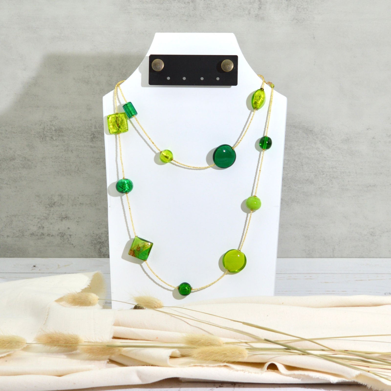 Long Murano glass beaded necklace in green and gold, handcrafted in Italy, featuring elegant Italian-made beads.