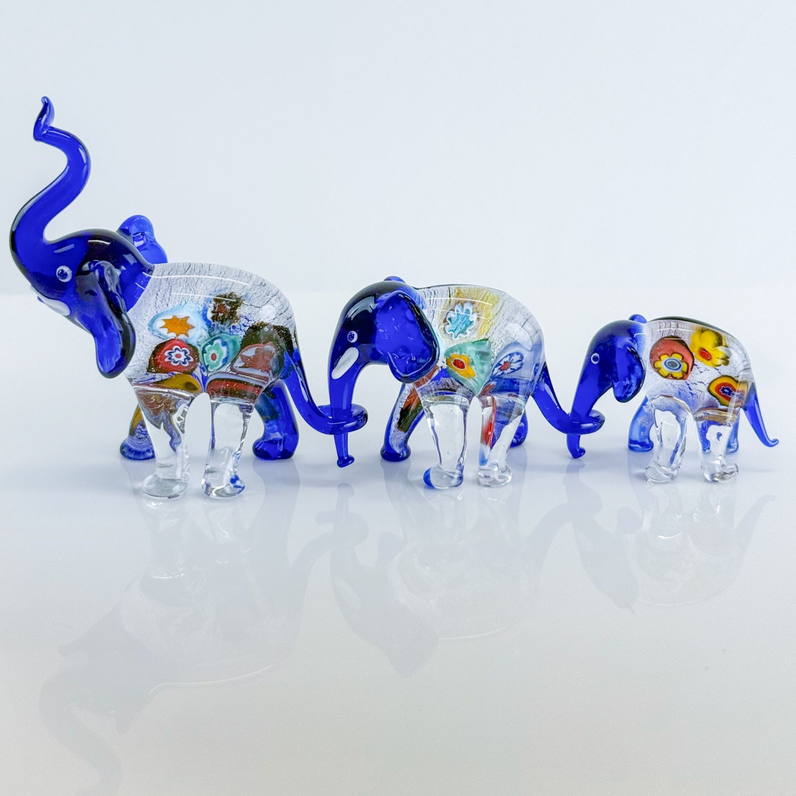 Colorful Murano glass elephant family figurine set with millefiori patterns, crafted by My Italian Decor.