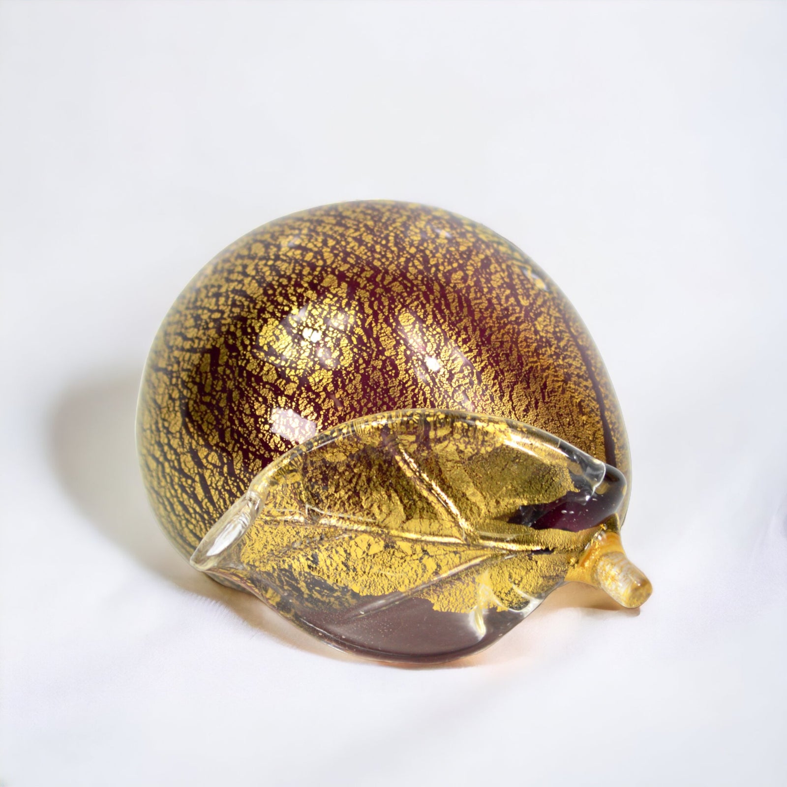 Life-size Murano glass plums, blown Italian glass fruit for artificial floral decor, featuring realistic textured surfaces.