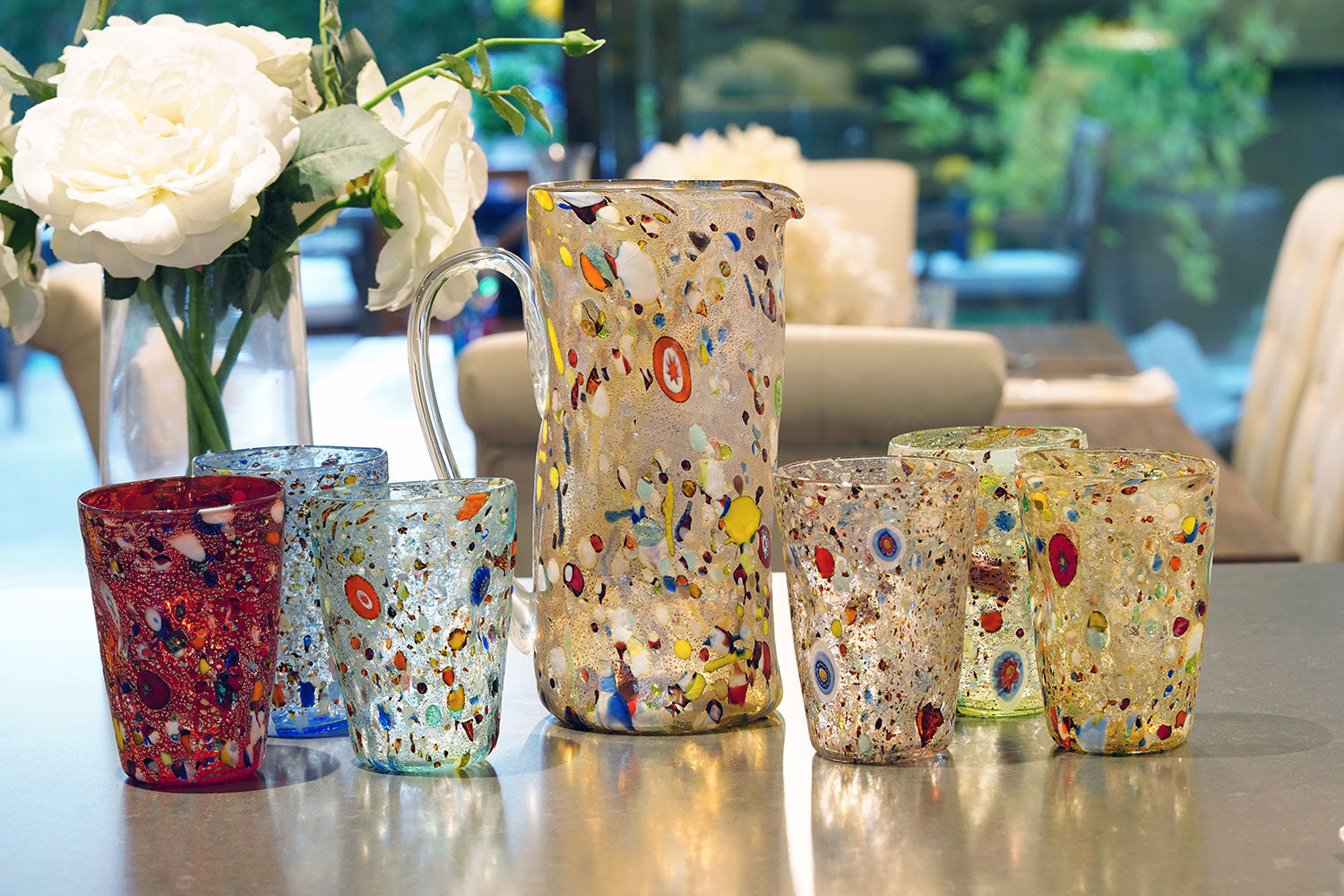 Murano glasses and pitcher with millefiori mosaic accents. My Italian Decor offers home decor items.