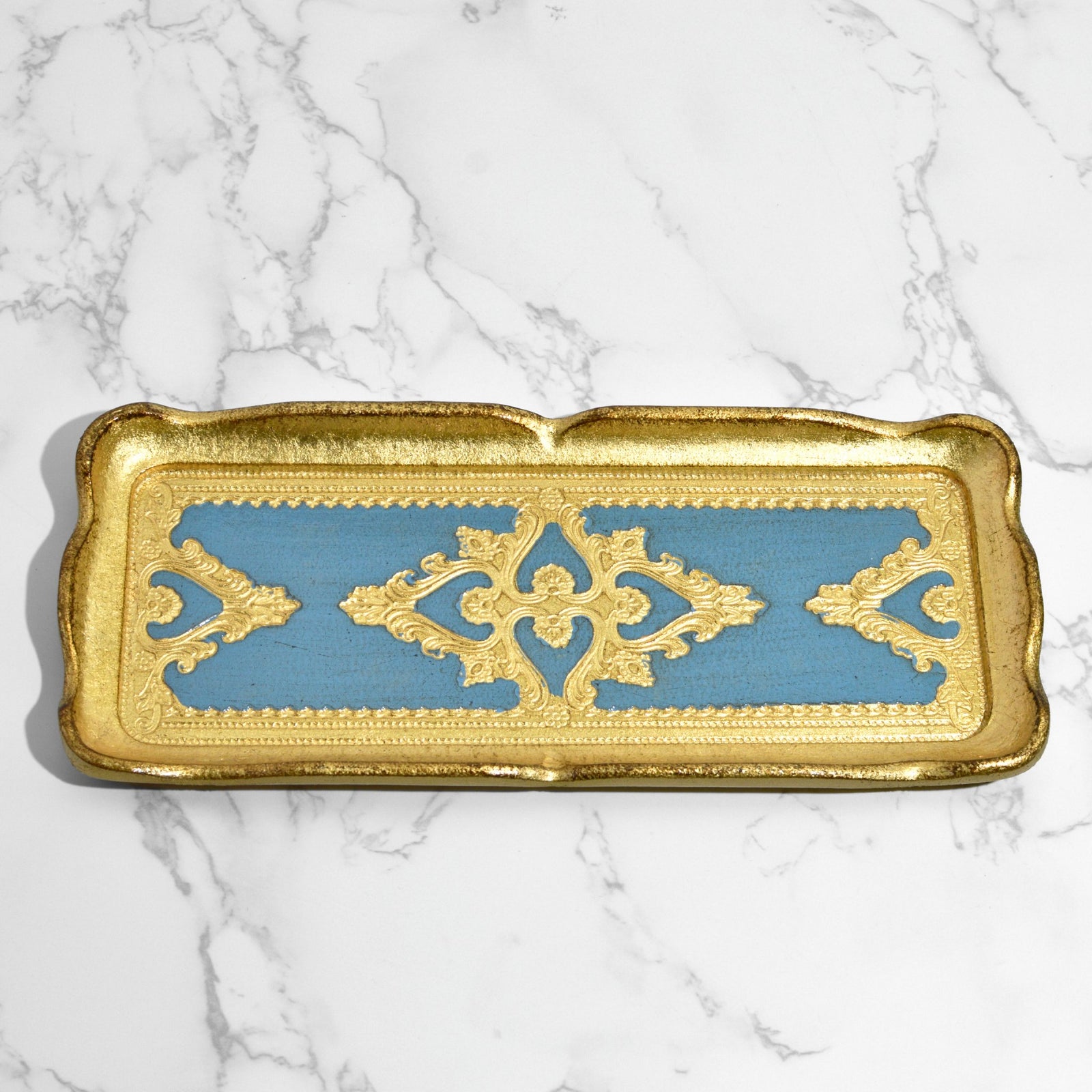 Close-up of a Florentine carved gilded wood decorative tray from Italy, showcasing intricate details and elegant craftsmanship.