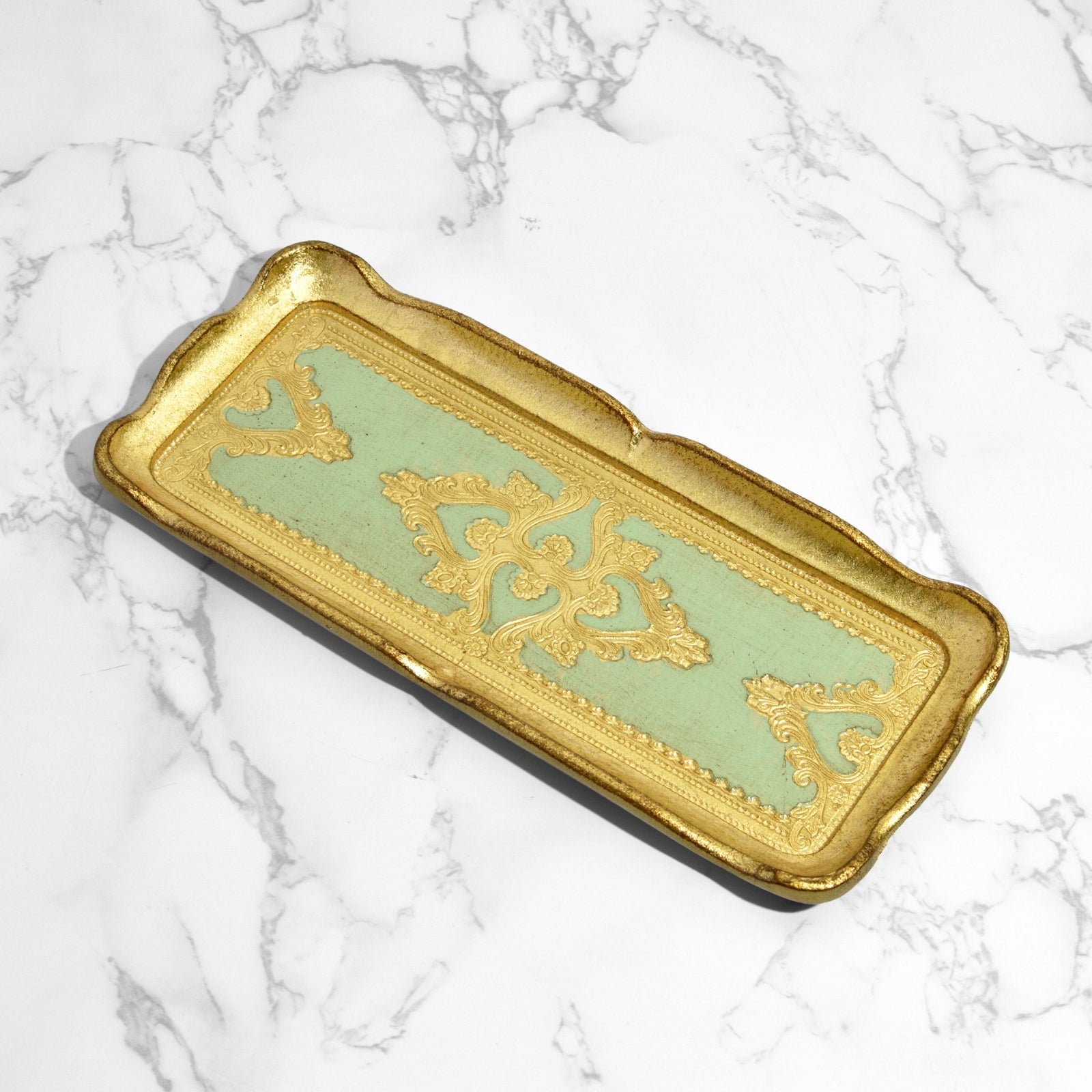 Close-up of a Florentine carved gilded wood narrow decorative tray from My Italian Decor, showcasing detailed Italian craftsmanship.