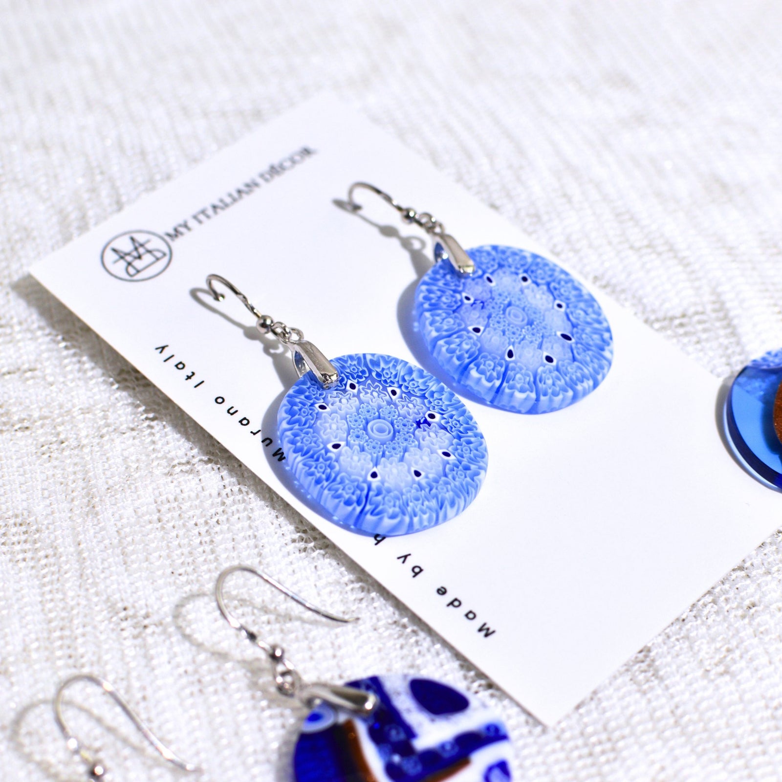 Blue Murano glass dangle earrings featuring circular design, handcrafted in Italy by My Italian Decor.