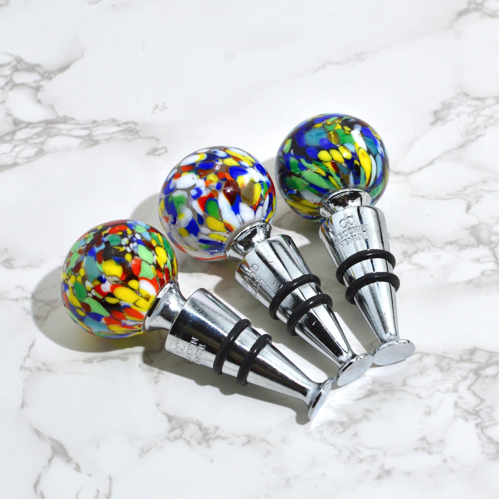 DZ Murano Glass Confetti Wine Stoppers, decorative bottle stoppers with colorful glass confetti details.