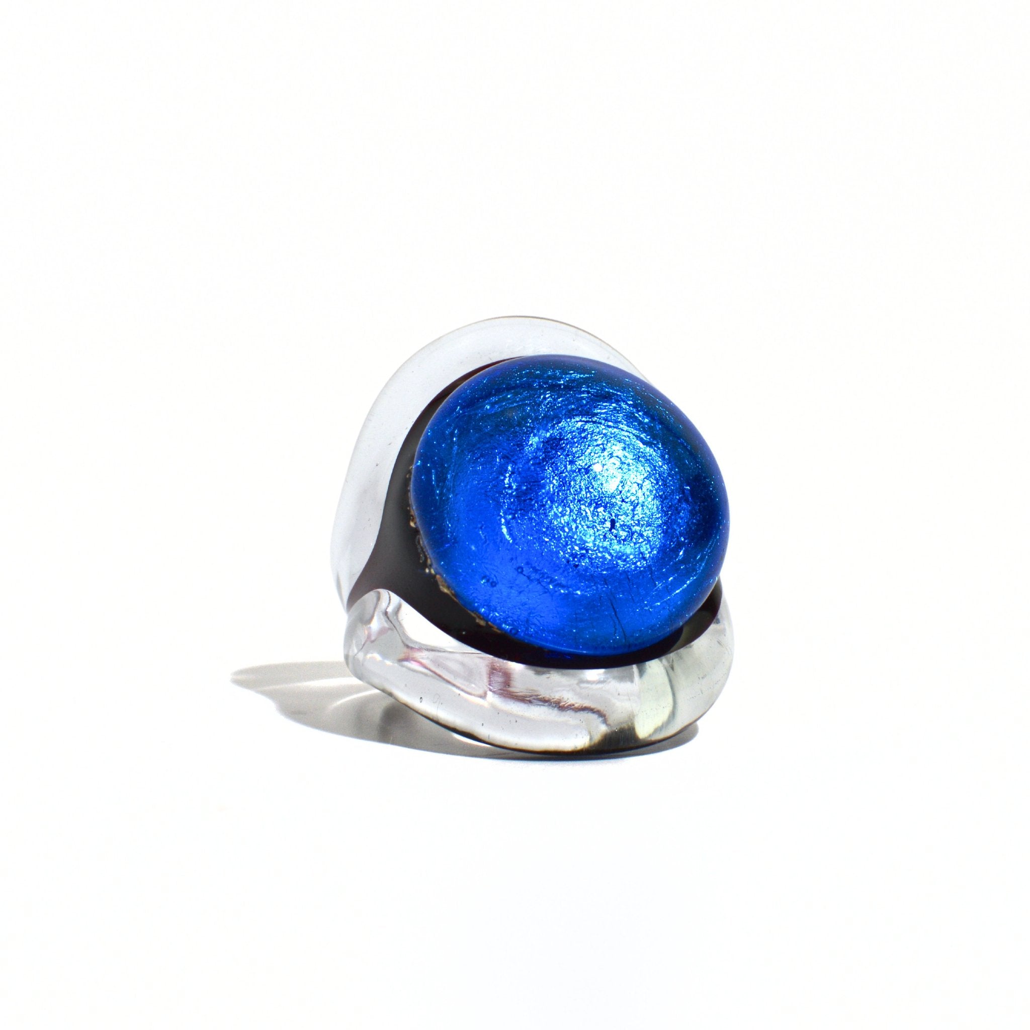 Close-up of a blue Murano glass Occhio statement ring by MyItalianDecor, showcasing intricate Italian glass craftsmanship and vibrant color.