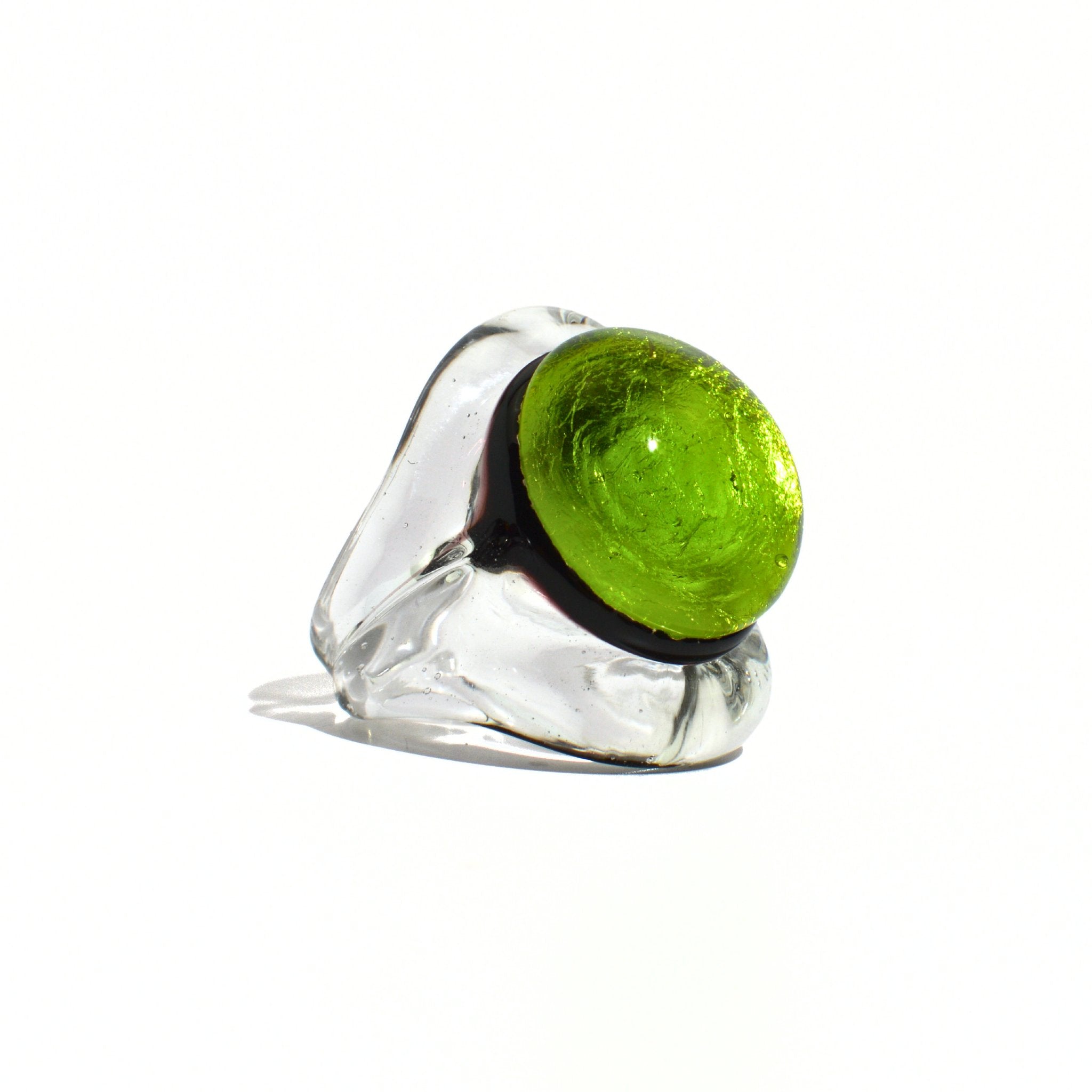 Close-up of a lime green Murano glass Occhio statement ring by MyItalianDecor, showcasing intricate Italian craftsmanship.