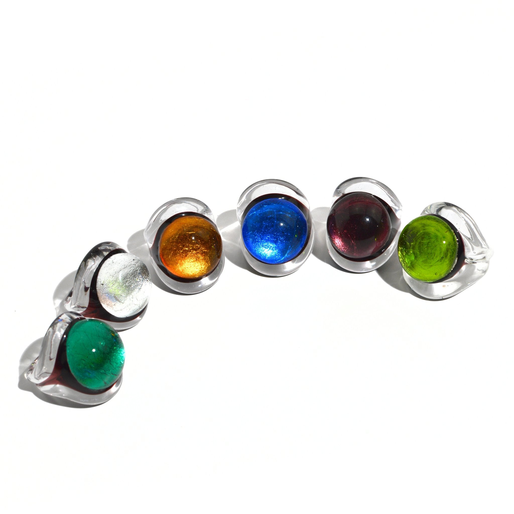 Set of Murano Glass Occhio Statement Rings by MyItalianDecor, featuring colorful handcrafted Italian glass designs in a lineup.
