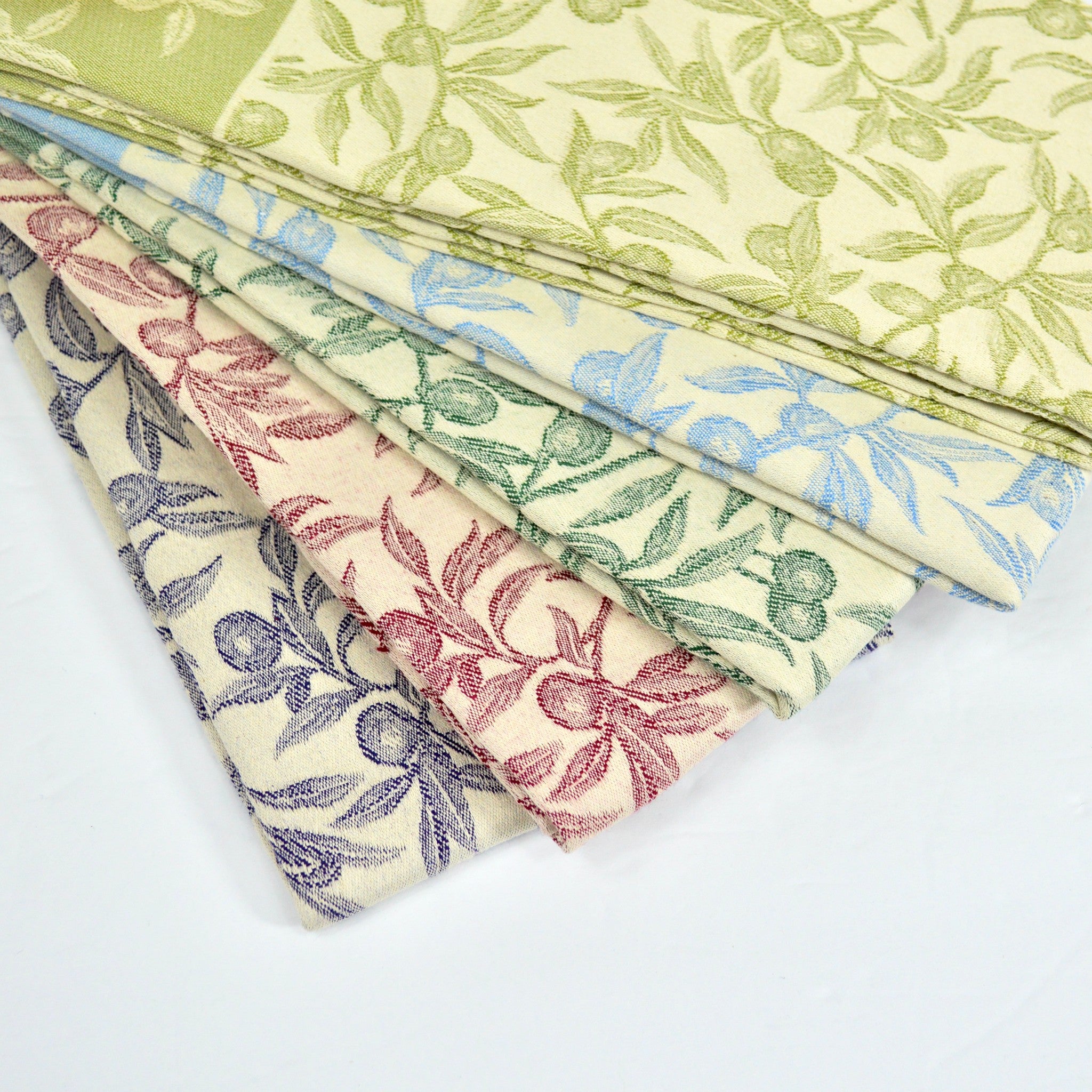Assorted colorful Busatti Oliva kitchen towels made of high-quality linen, displayed in a variety of vibrant shades.