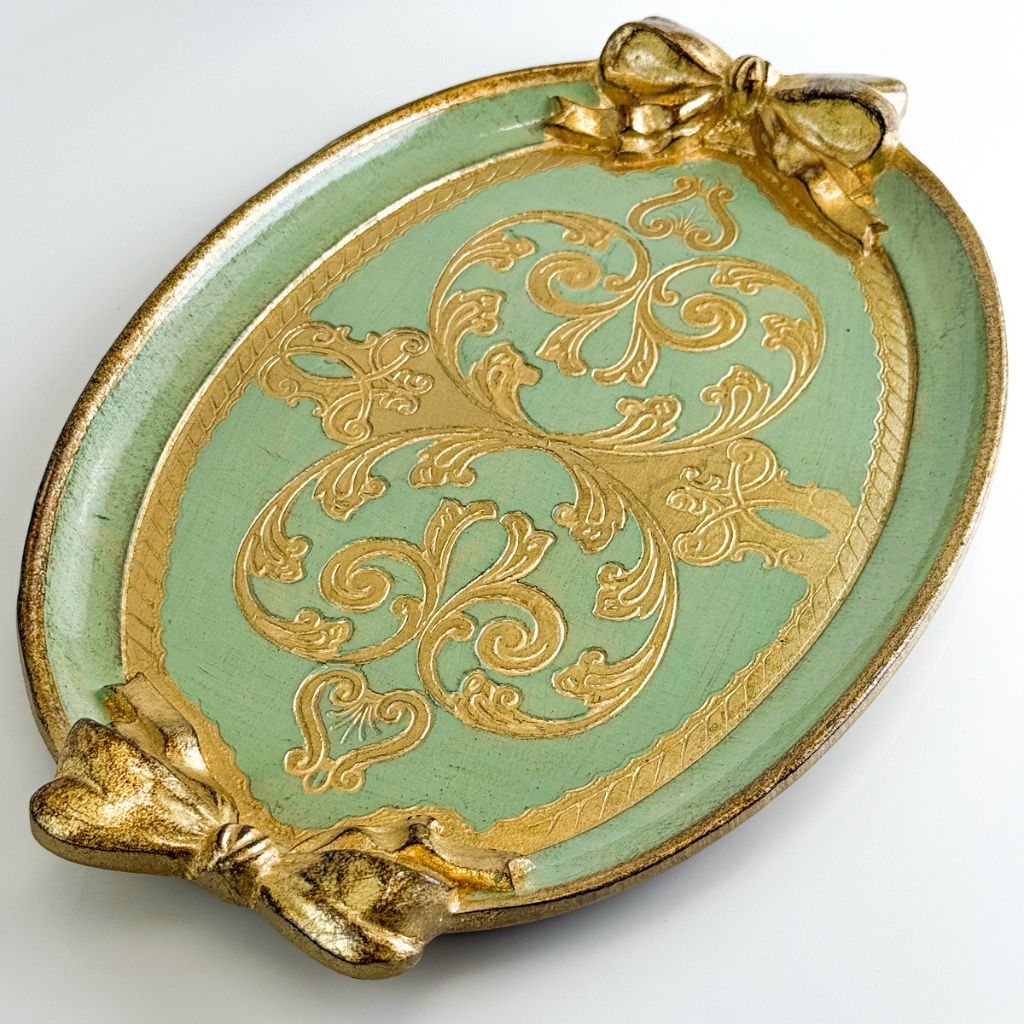 Decorative Florentine carved oval bow tray in various colors, made in Italy, featuring intricate Italian craftsmanship.