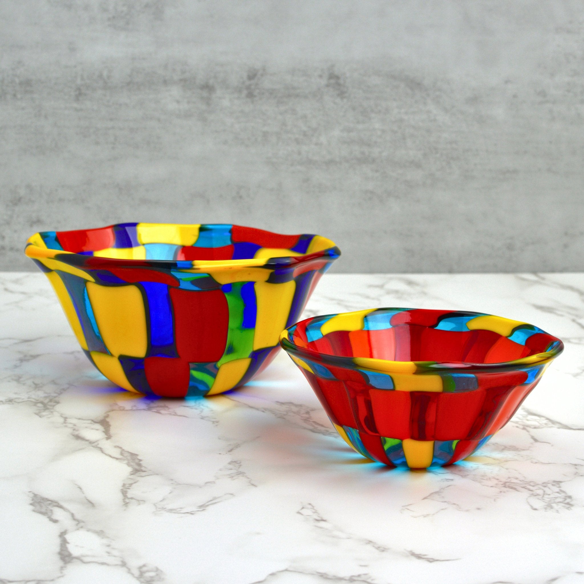 Murano Glass multicolored bowls on table, one small, one medium