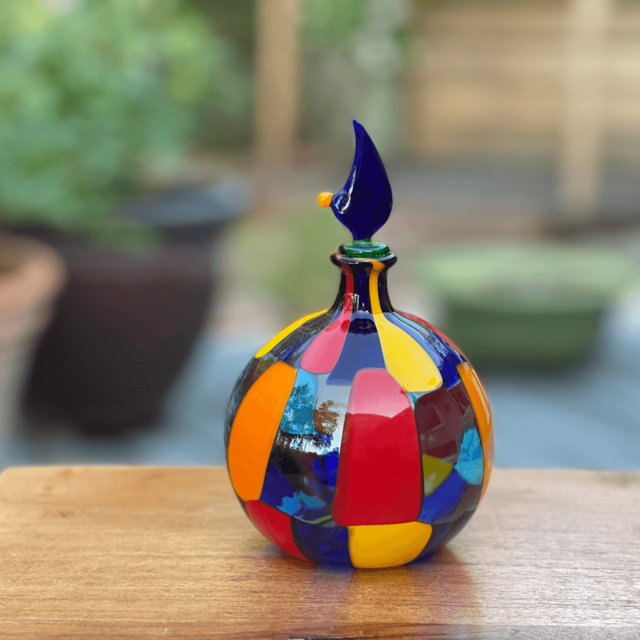 Handblown Murano glass perfume bottle with cobalt stopper, decorative art piece from Pazzia by MyItalianDecor.