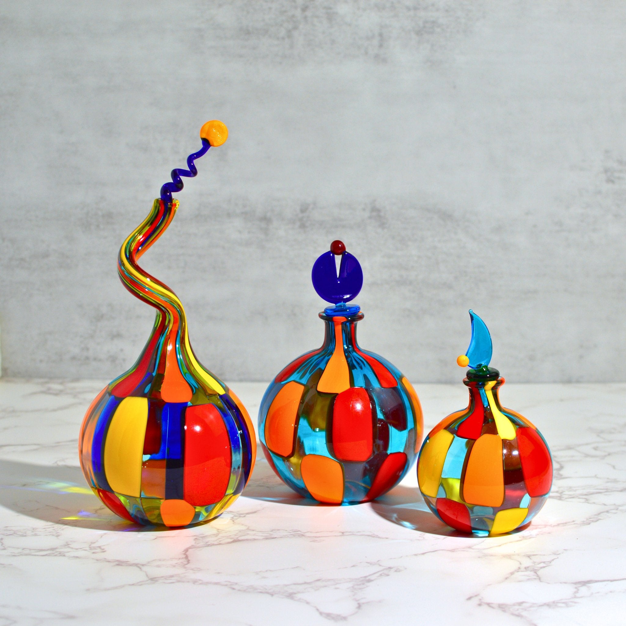 Handblown Murano glass perfume bottle with marble accents, decorative art piece from Pazzia by MyItalianDecor