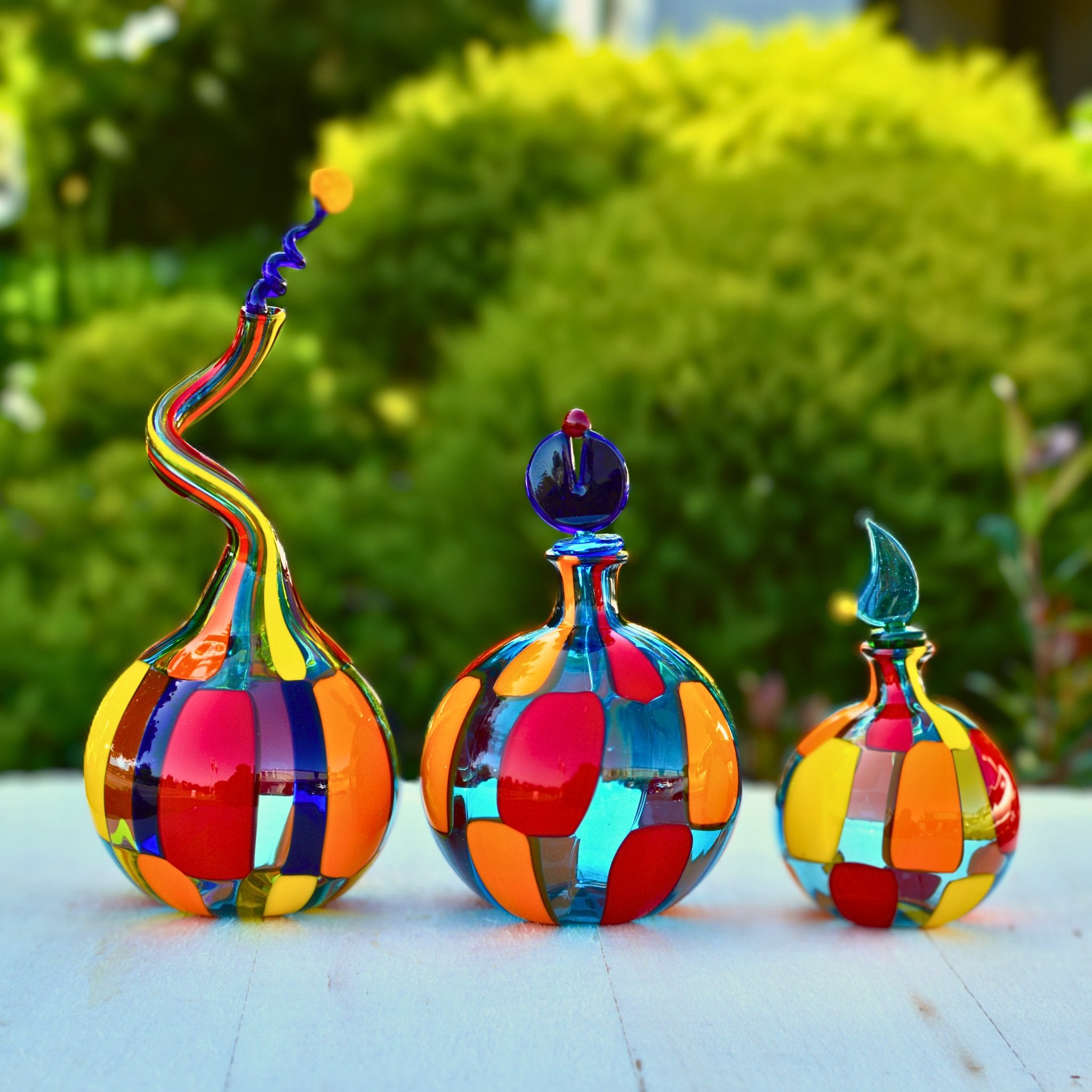 Handblown Pazzia Murano glass perfume bottle from MyItalianDecor, showcasing its decorative design and vibrant glass craftsmanship.