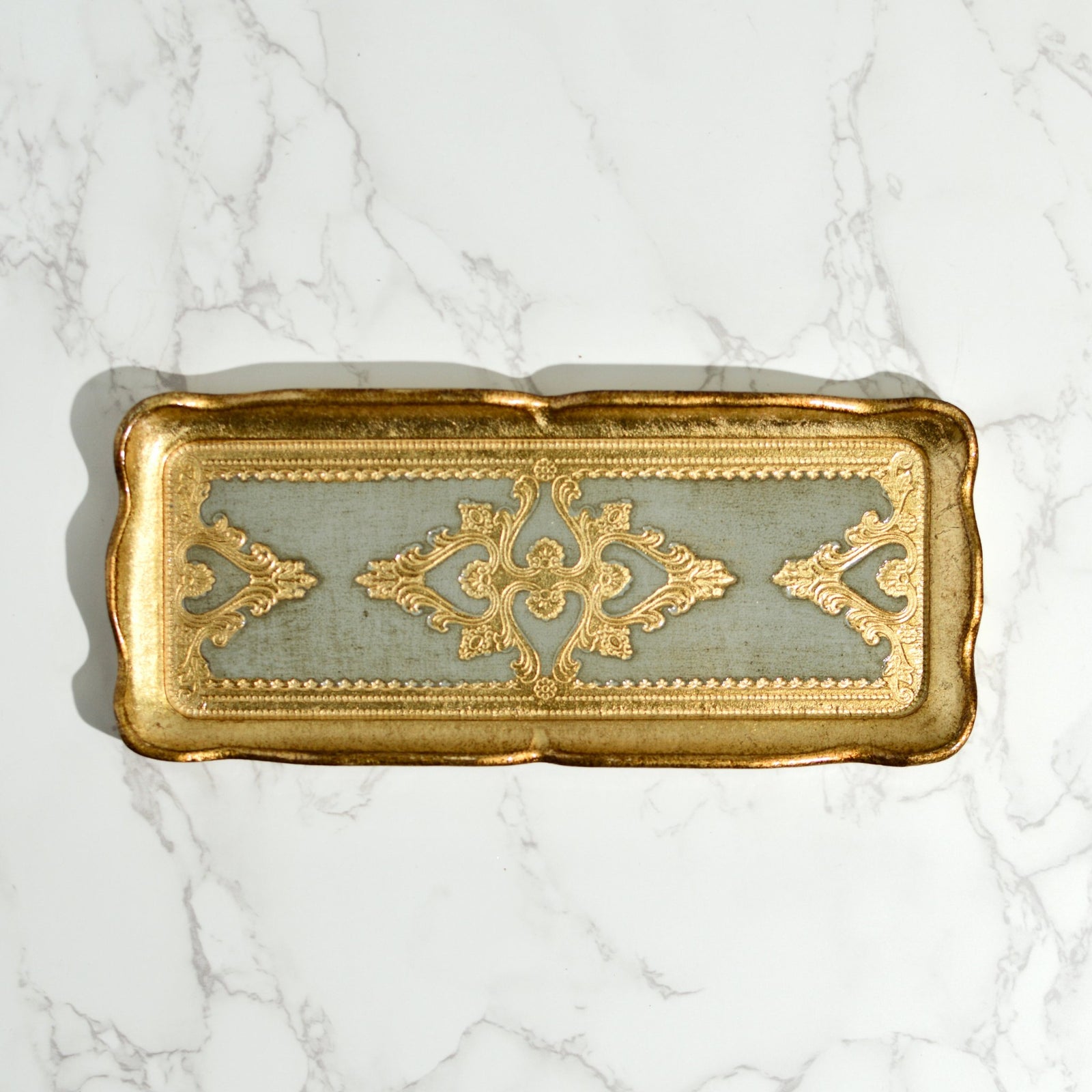 Close-up of a Florentine carved gilded wood decorative tray from Italy, showcasing intricate details and elegant craftsmanship.